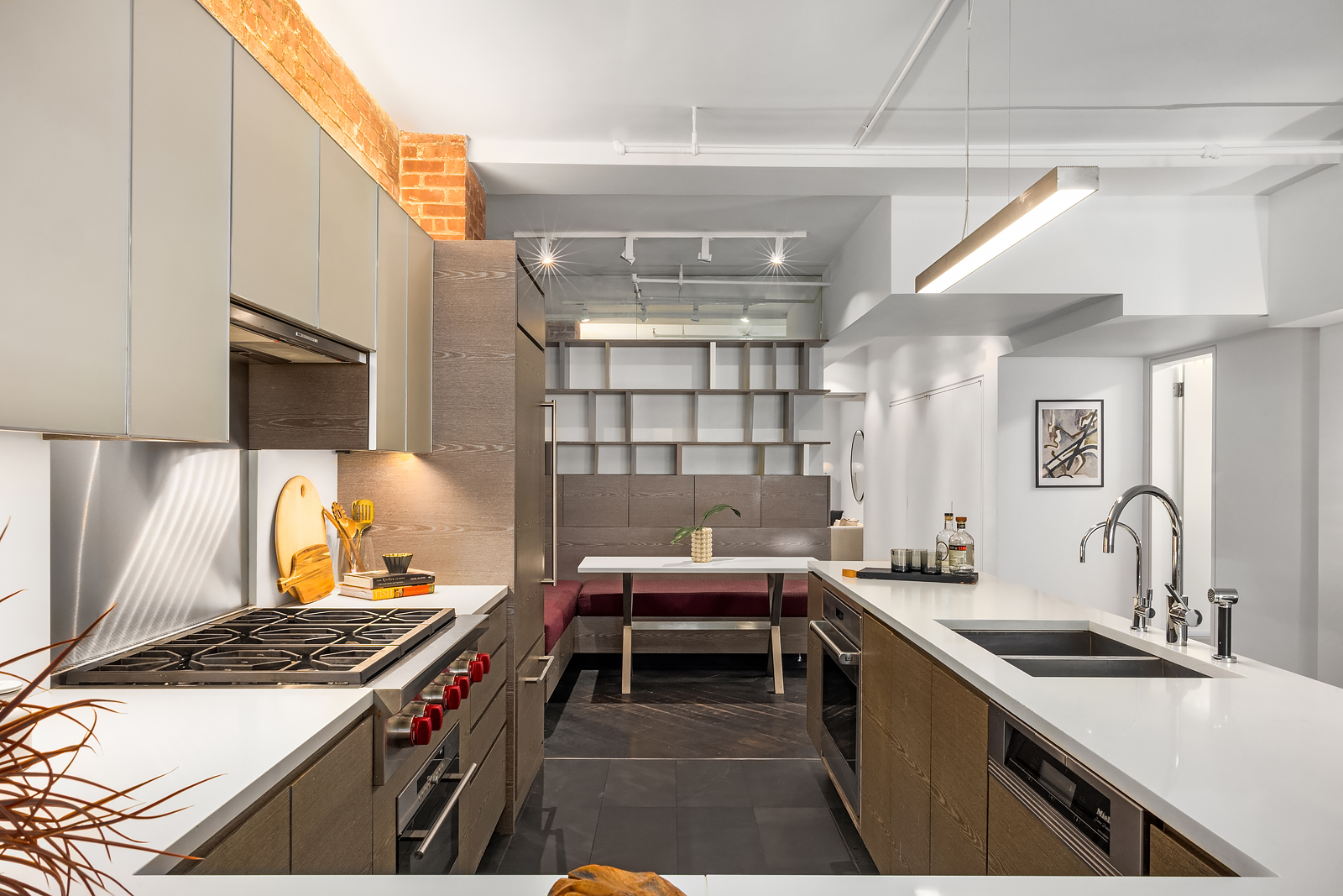 36 West 15th Street, Unit 4 Manhattan, NY 10011 - Photo 9 of 21 a kitchen with a stove and a sink
