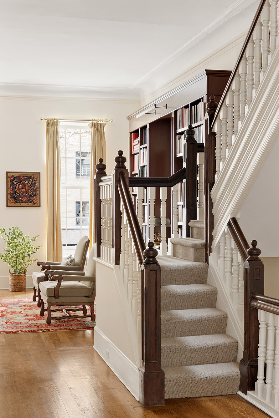 129 East 81st Street Manhattan, NY 10028 - Photo 8 of 17 a living room with furniture and a floor to ceiling window