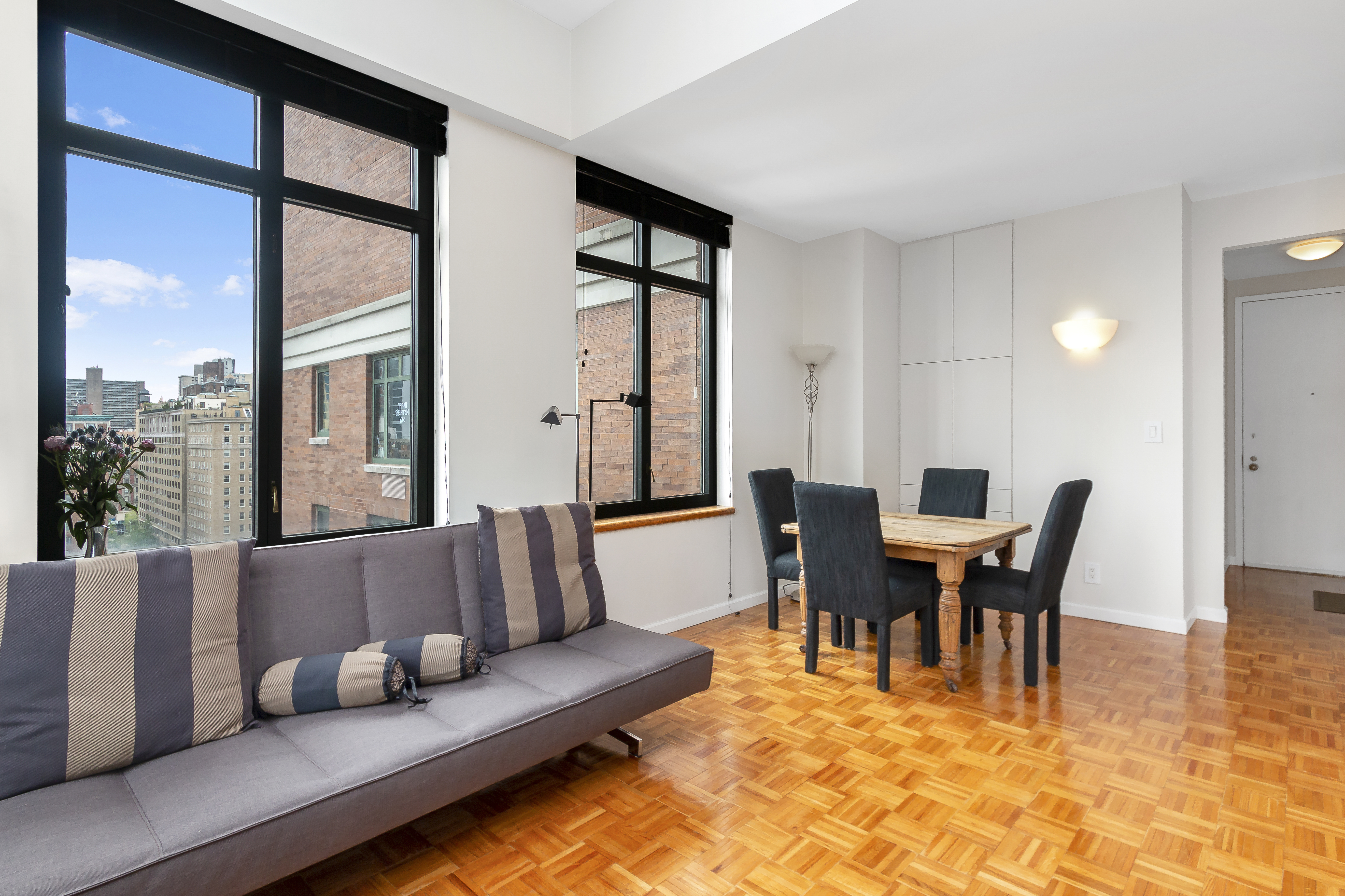 222 Riverside Drive, Unit PH2E Manhattan, NY 10025 - Photo 3 of 18 a view of a dining room with furniture and window