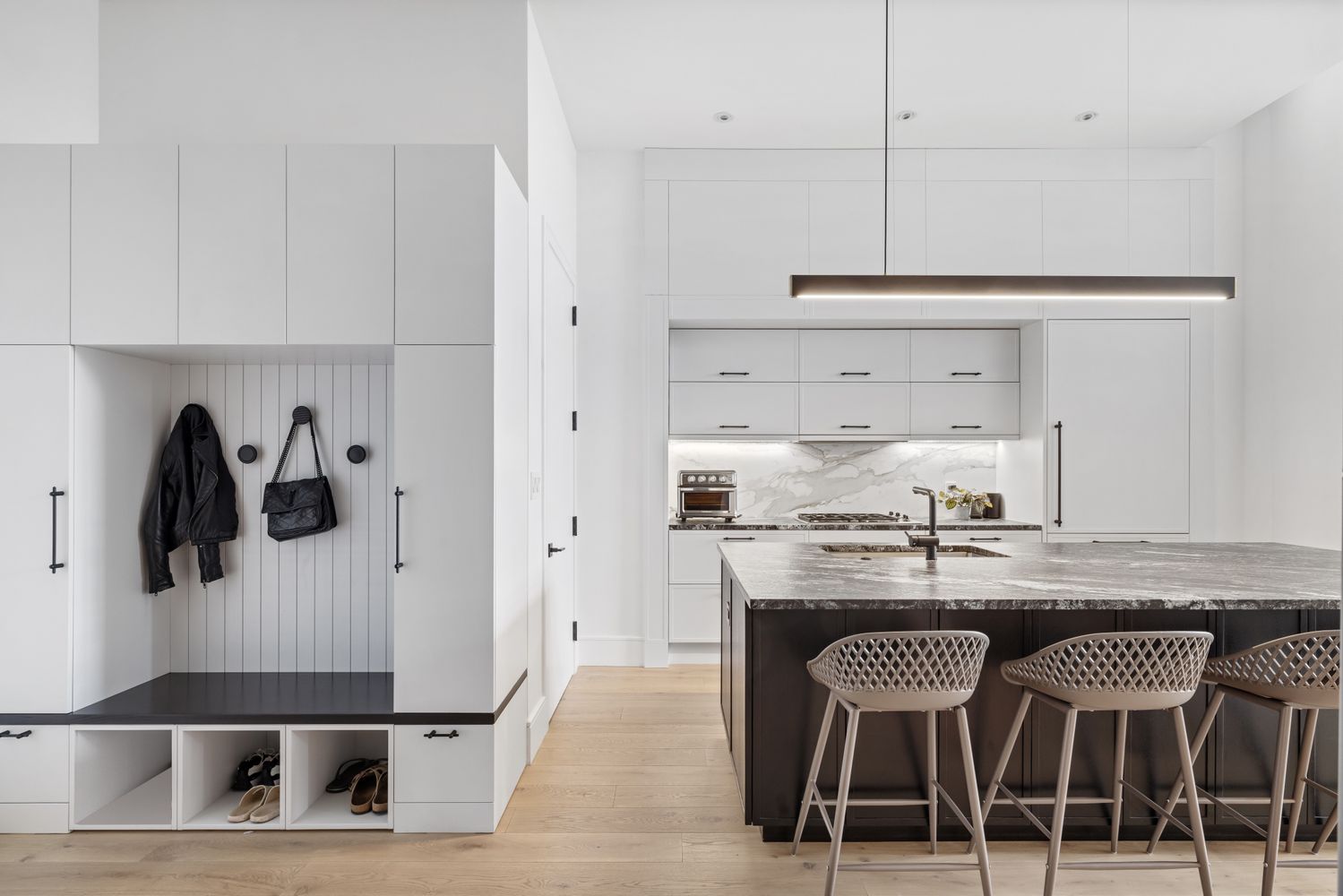 a kitchen with stainless steel appliances granite countertop a stove a refrigerator and cabinets