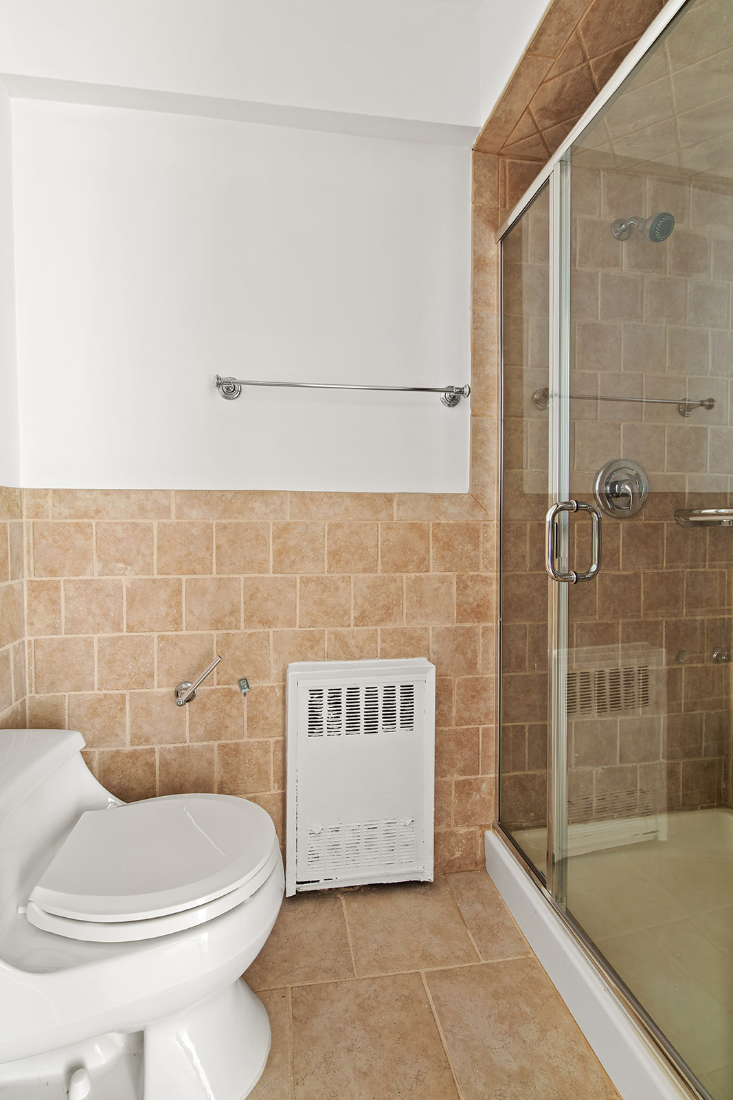 572 92nd Street Brooklyn, NY 11209 - Photo 19 of 20 a bathroom with a toilet and a shower