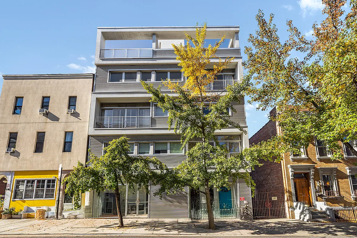 361 Manhattan Avenue, Unit 3AB Brooklyn, NY 11211 - Photo 18 of 21 a front view of a building with a garden