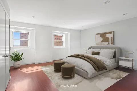 a bedroom with furniture and a couch