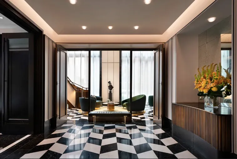 a living room with furniture and a large window