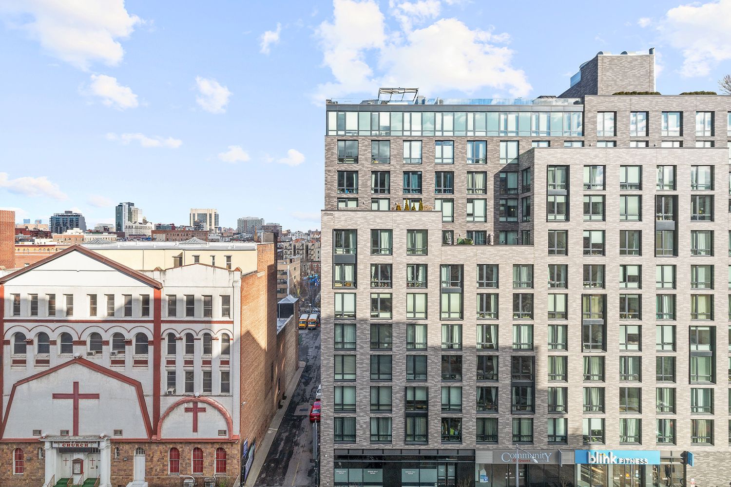 40 West 116th Street, Unit A808 Manhattan, NY 10026 - Photo 8 of 19 a view of a big building with a lot of windows