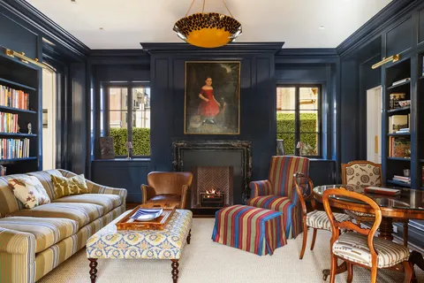 a kitchen with a sink cabinets and window