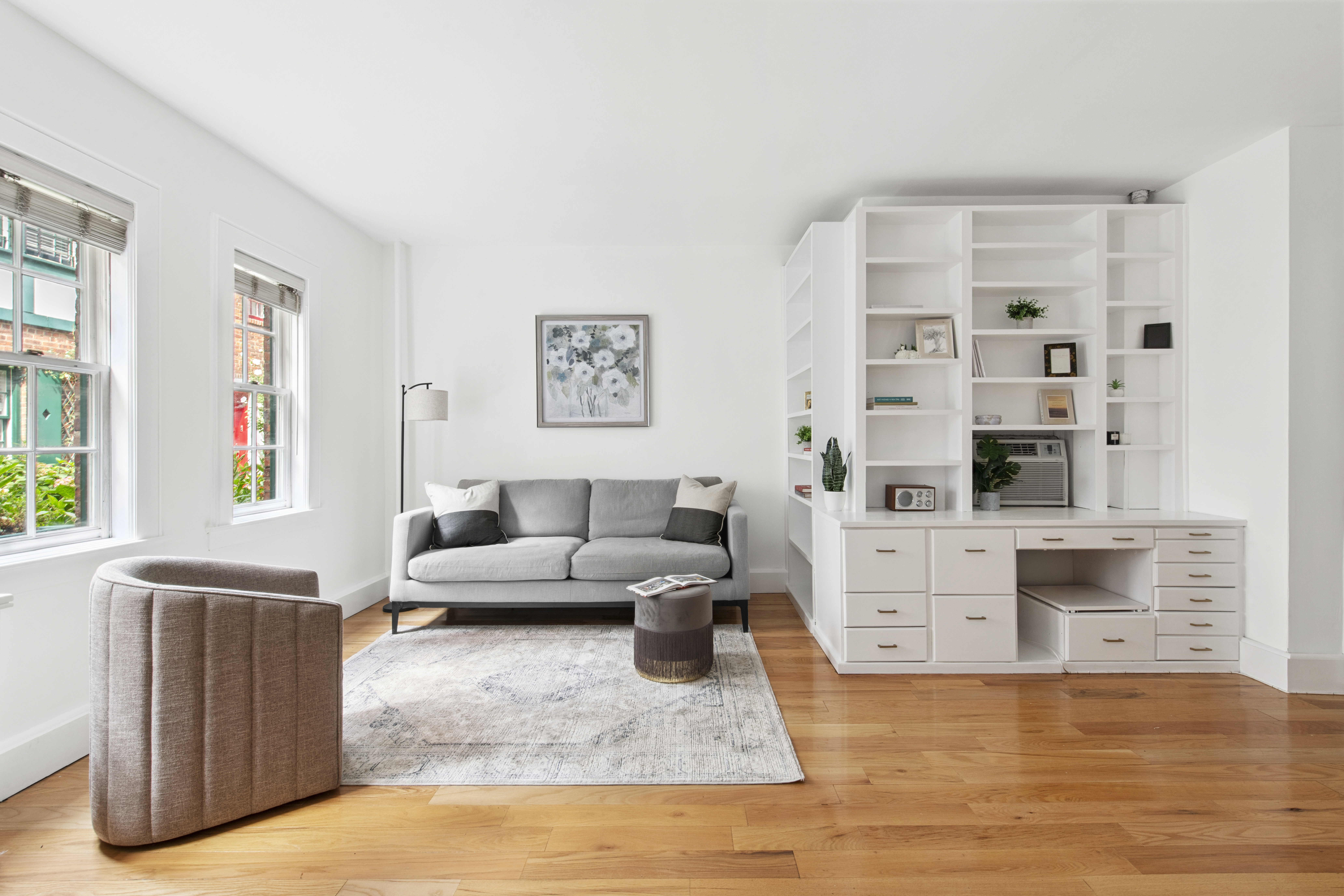 10 Pomander Walk, Unit 1 Manhattan, NY 10025 - Photo 4 of 13 a living room with furniture window and wooden floor