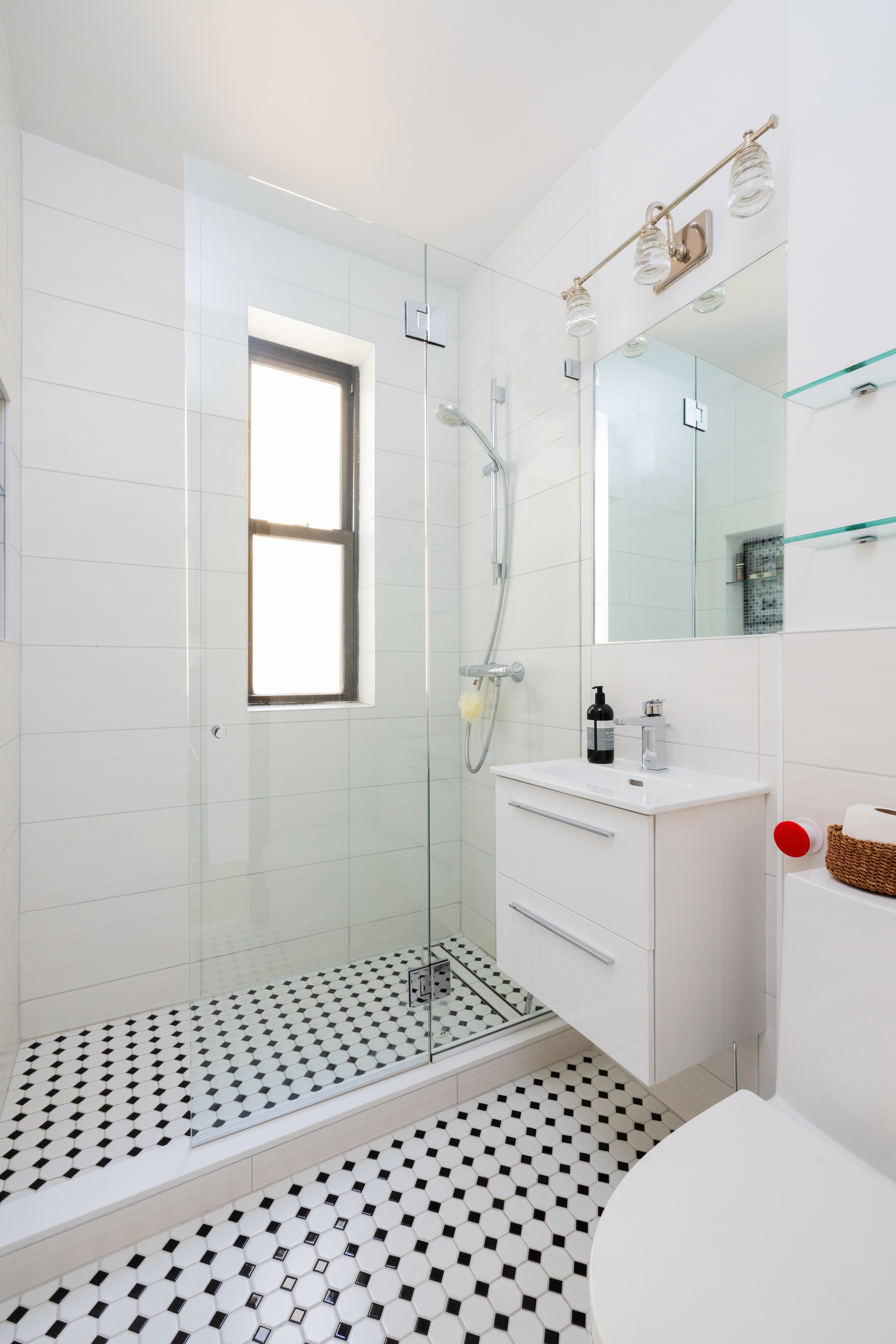 124 West 93rd Street, Unit 6E Manhattan, NY 10025 - Photo 7 of 9 a bathroom with a sink a toilet and shower
