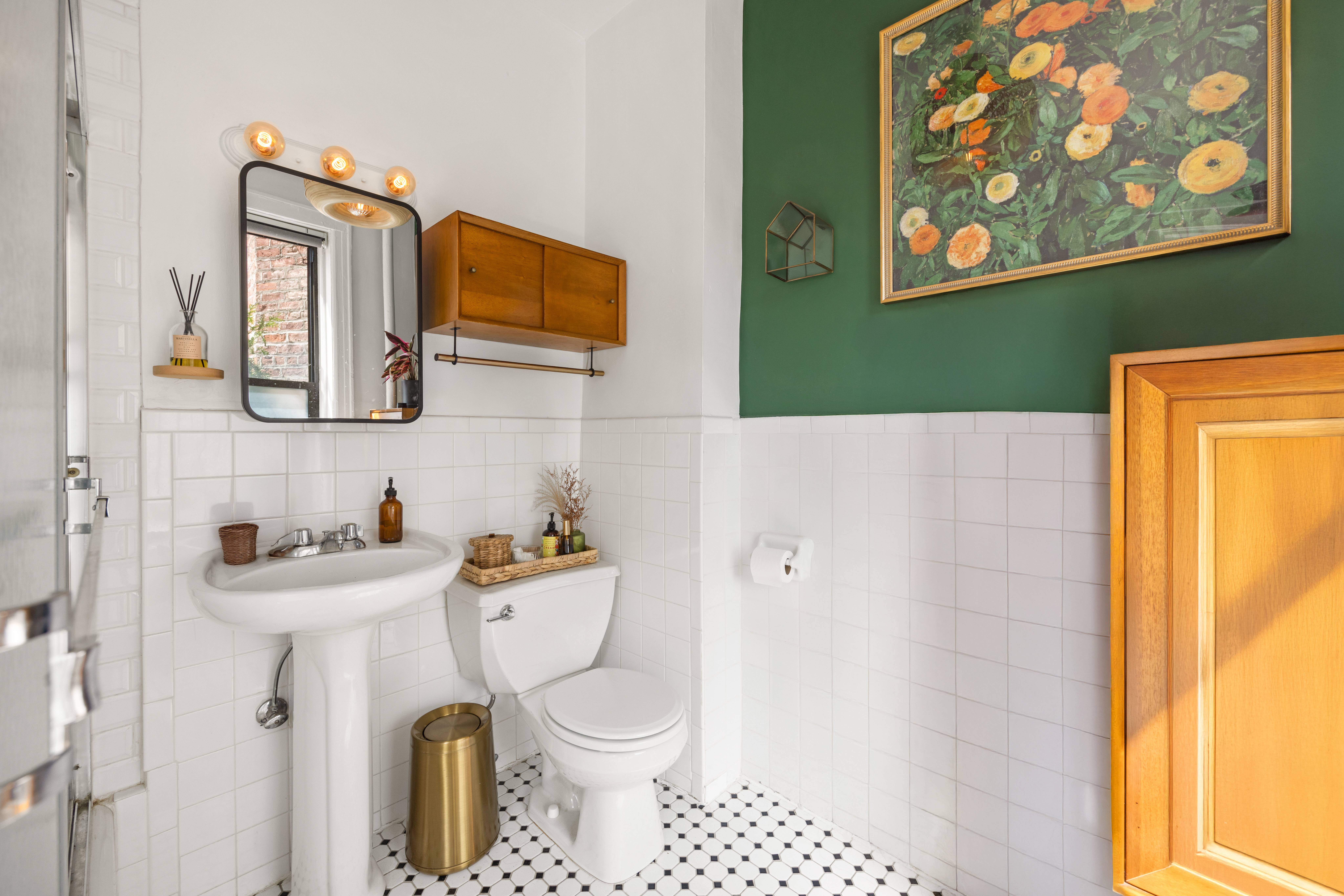 192-194 Union Street Brooklyn, NY 11231 - Photo 18 of 37 a bathroom with a toilet sink and mirror