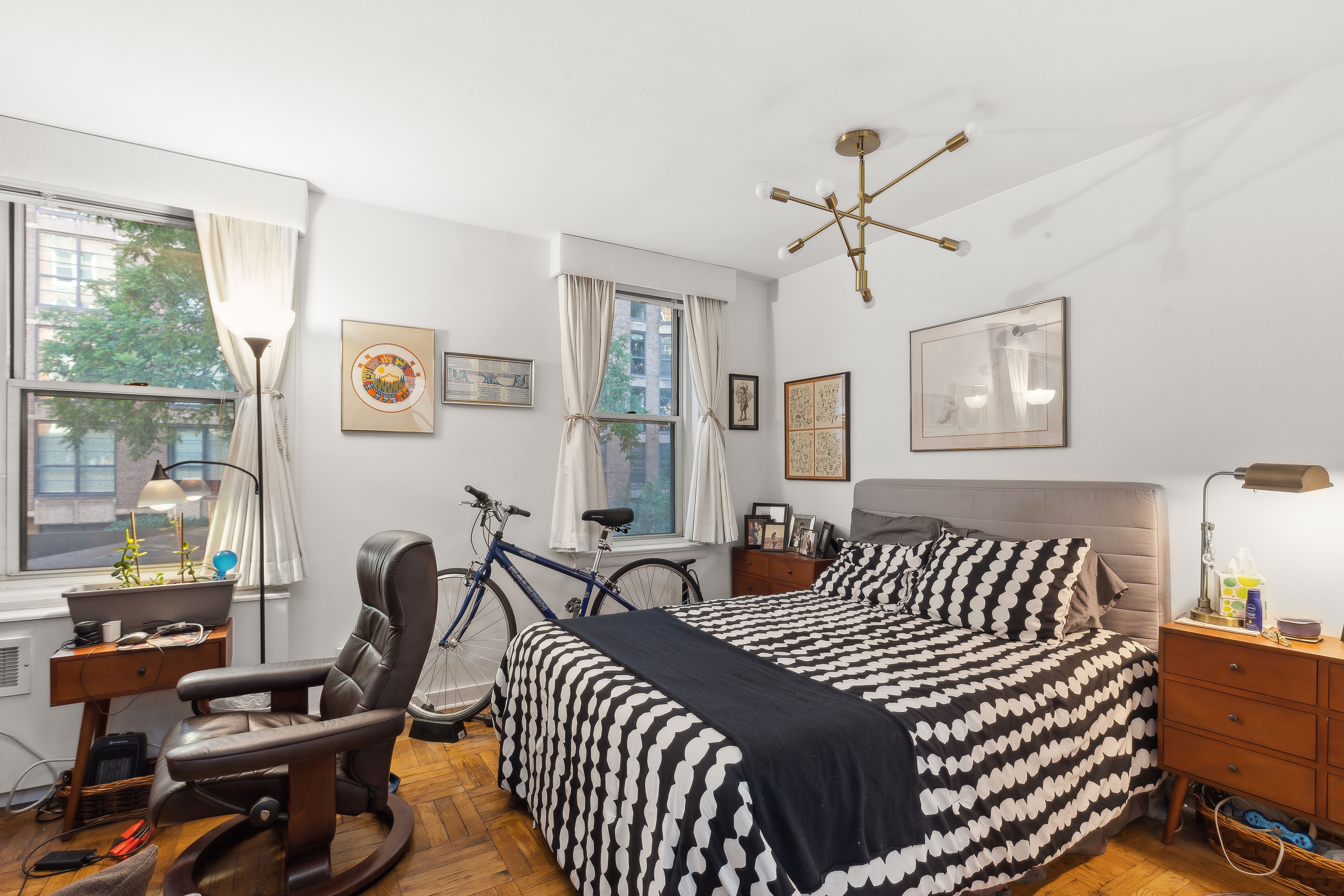 13 West 13th Street, Unit 2DS Manhattan, NY 10011 - Photo 4 of 19 a bedroom with furniture and a window