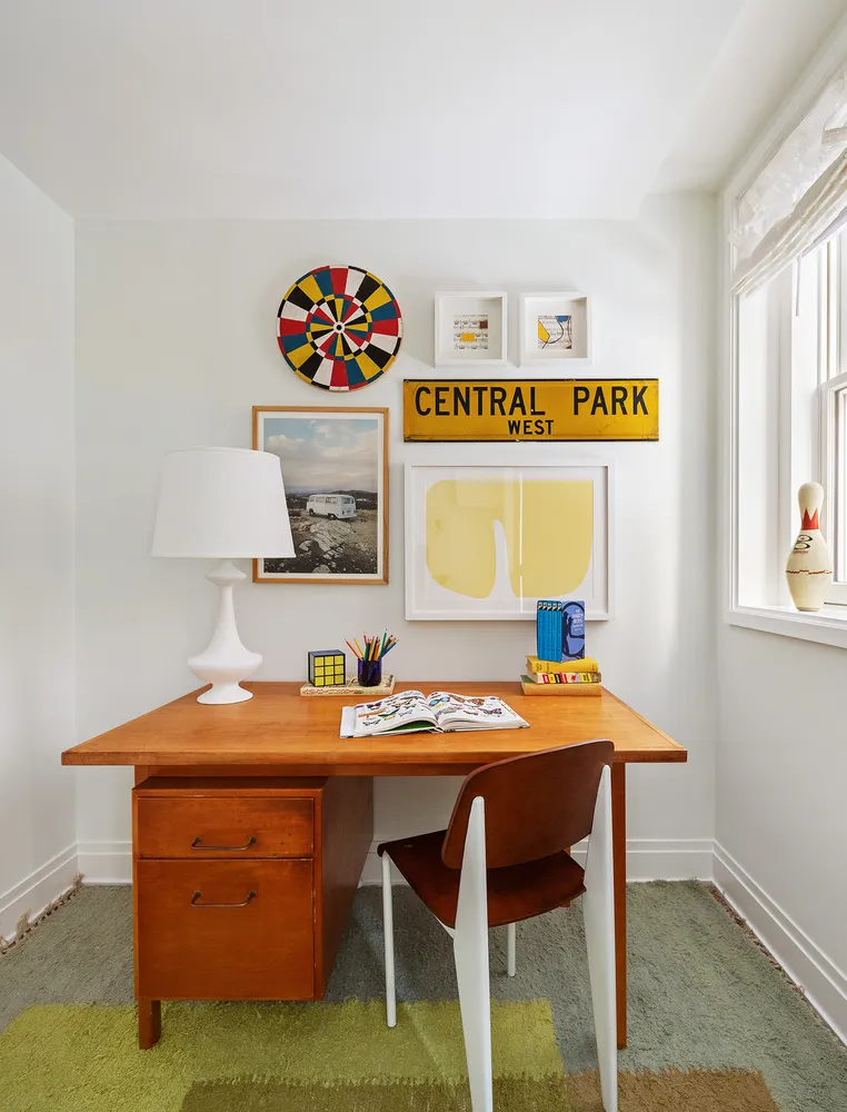 a room with a table and chairs