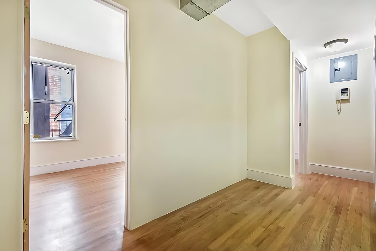 247 East 81st Street, Unit 3E Manhattan, NY 10028 - Photo 2 of 6 a view of hallway with wooden floor