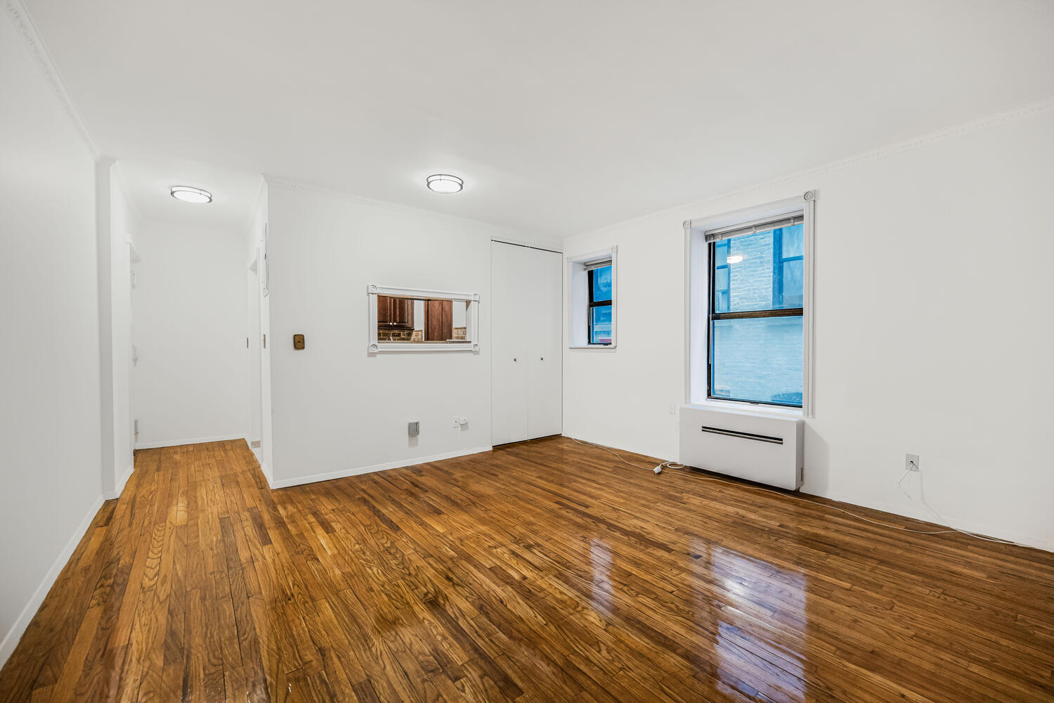 4 West 109th Street, Unit 4F Manhattan, NY 10025 - Photo 3 of 16 a view of empty room with wooden floor