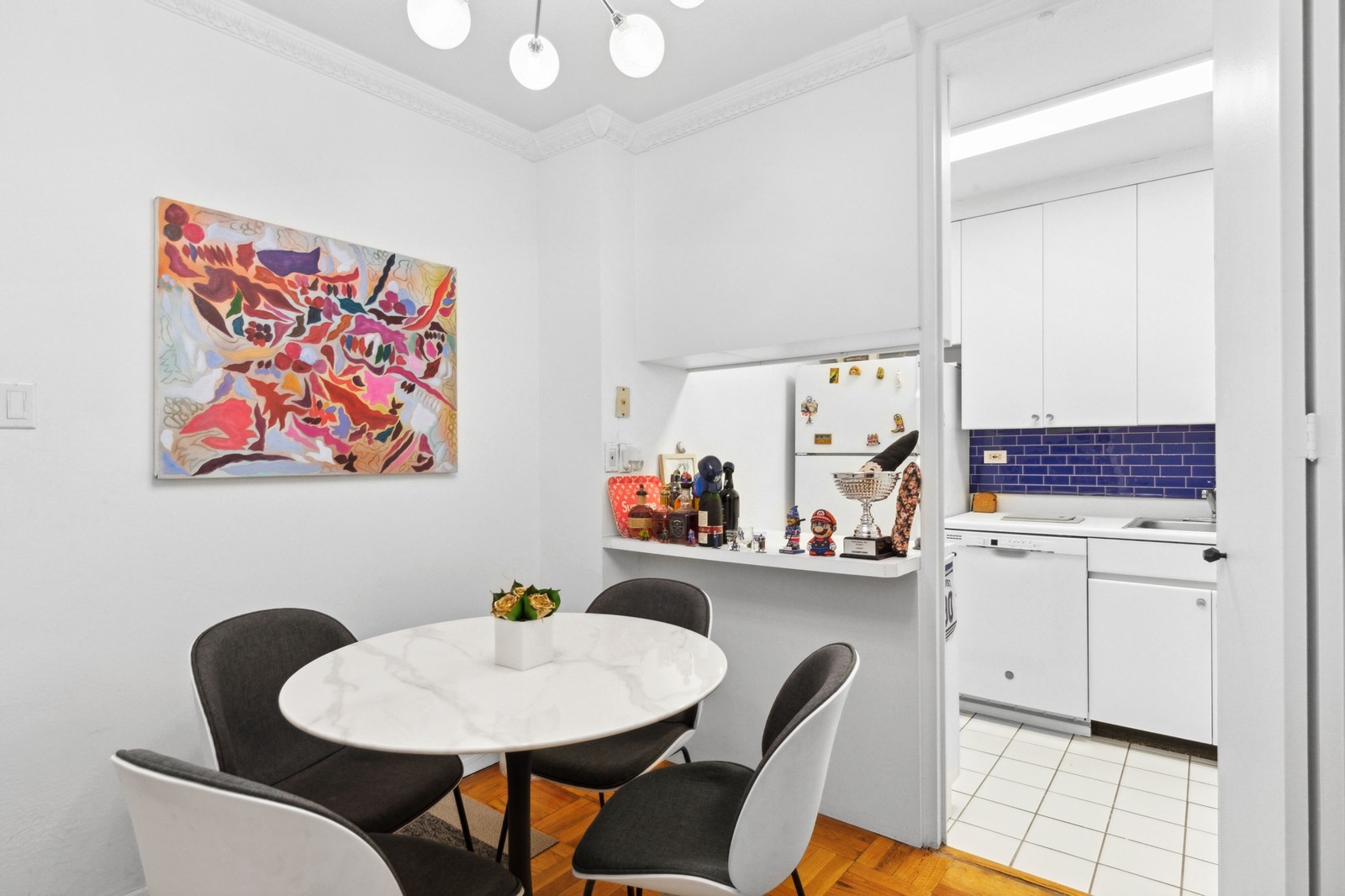 300 East 40th Street, Unit 9V Manhattan, NY 10016 - Photo 2 of 7 a view of a dining room with furniture