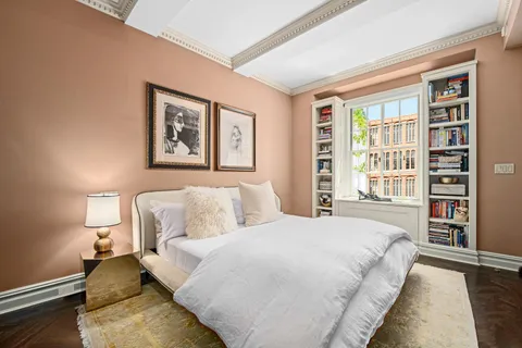 a bathroom with a sink mirror and a shower
