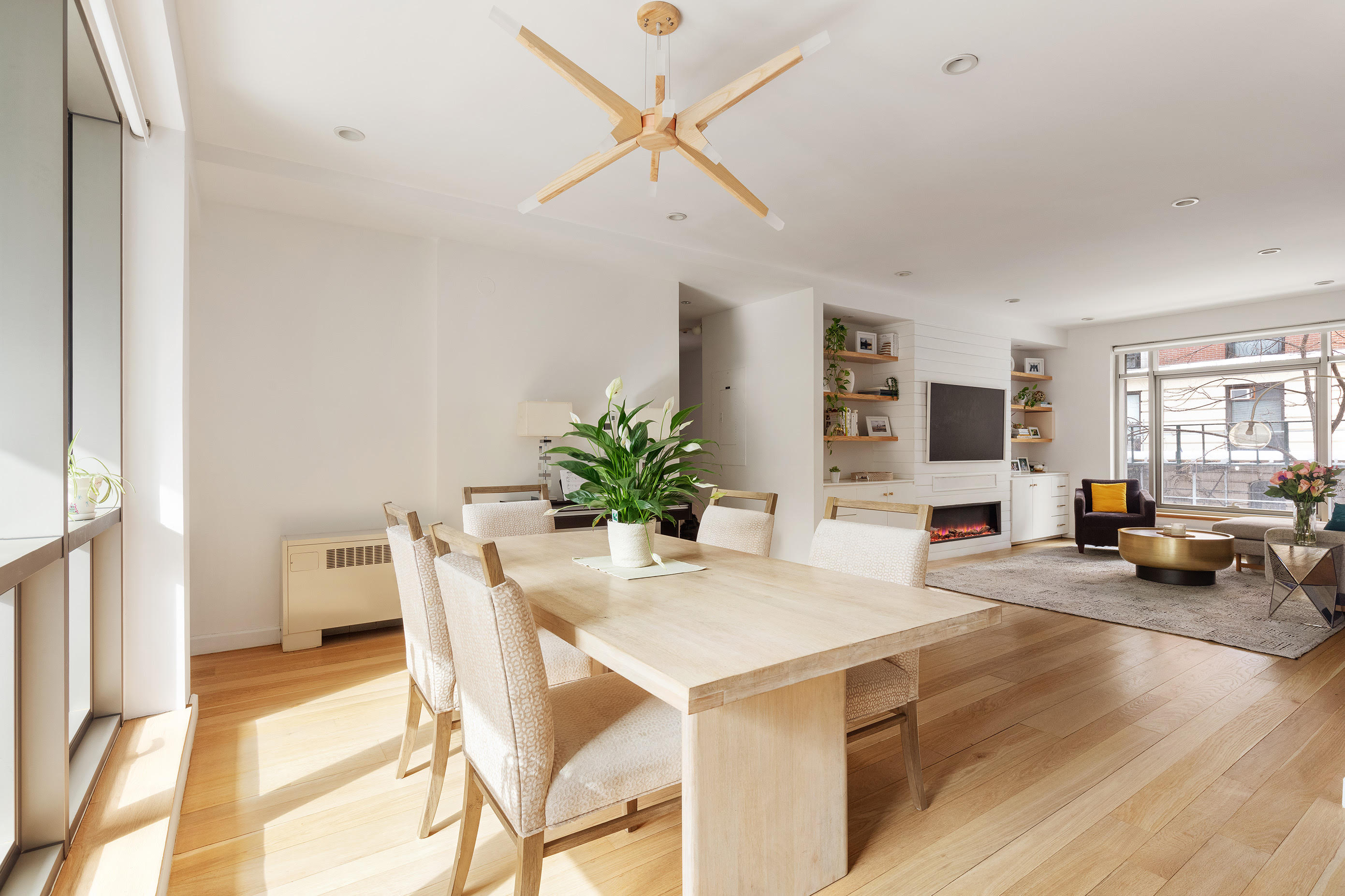 132 East 30th Street, Unit 2 Manhattan, NY 10016 - Photo 2 of 14 a view of a dining room with furniture and a chandelier