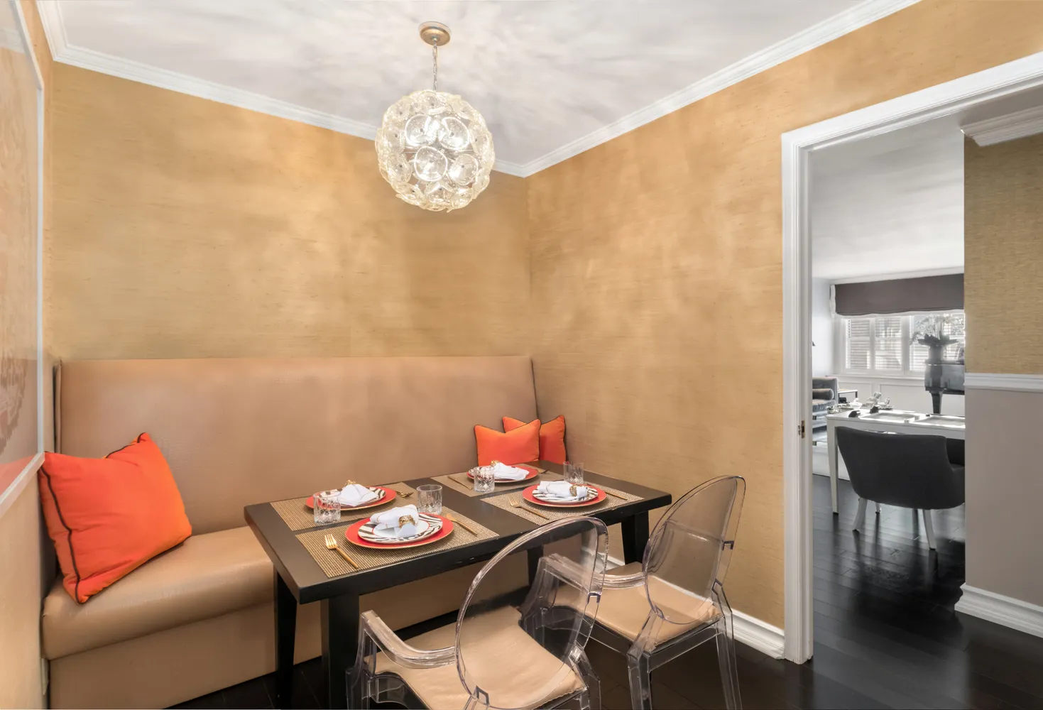 a view of a dining room with furniture and wooden floor