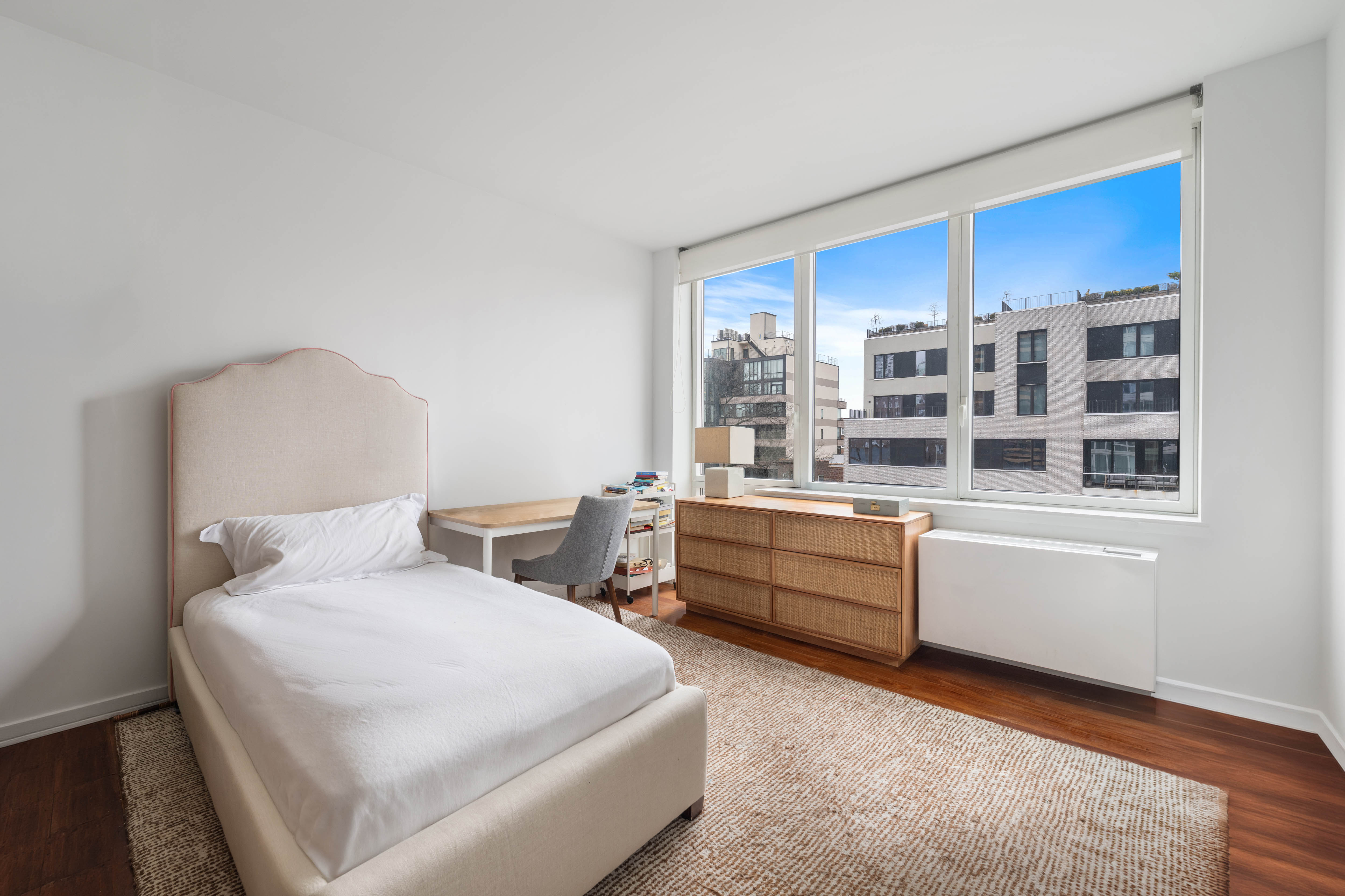 640 West 237th Street, Unit 6D Bronx, NY 10463 - Photo 7 of 9 a bedroom with furniture and windows