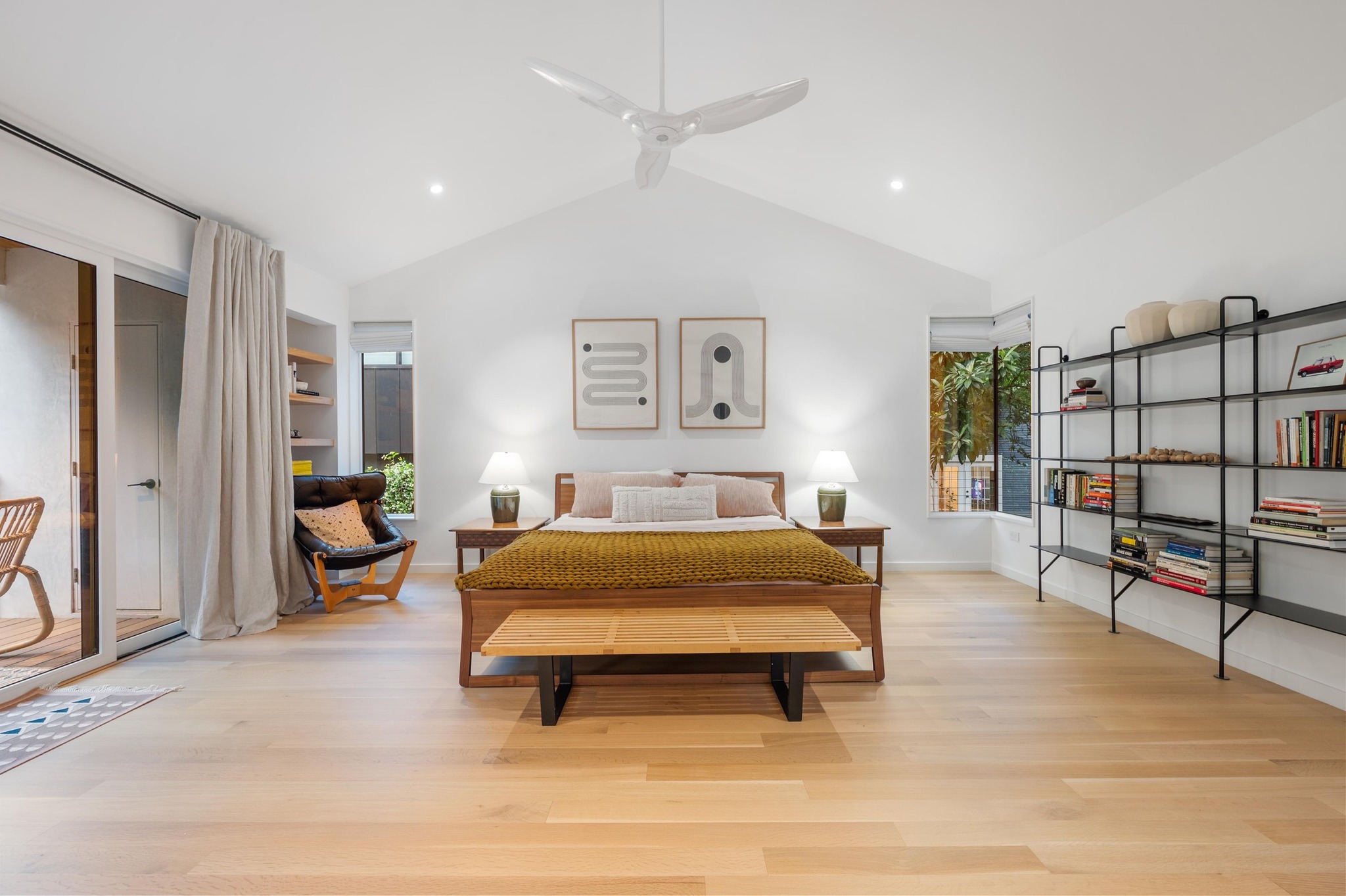 1206 Bickler Road Austin, TX 78704 - Photo 37 of 65 a bed room with furniture and a lamp