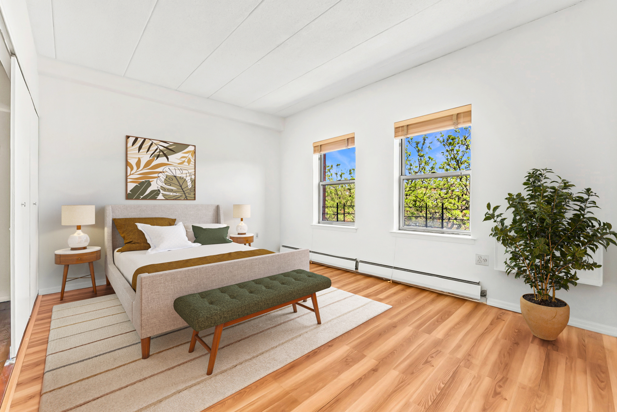 2573 Frederick Douglass Boulevard, Unit D Manhattan, NY 10030 - Photo 4 of 13 a spacious bedroom with a bed and a large window