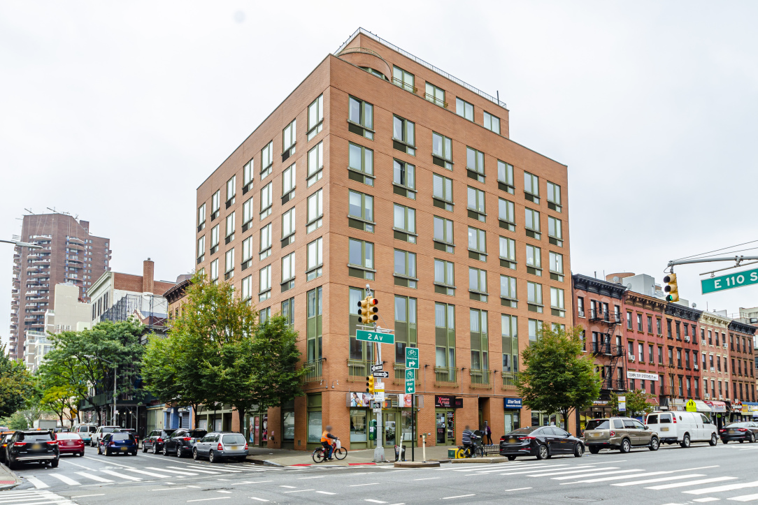 a view of a building and a street