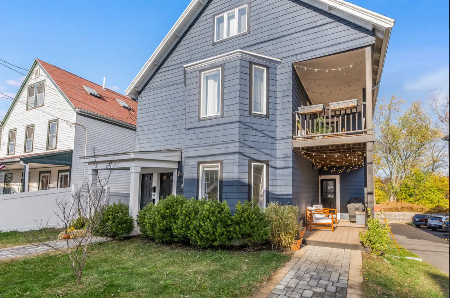 a front view of a house with garden