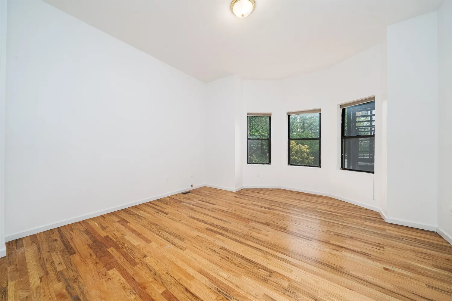 a view of an empty room with window