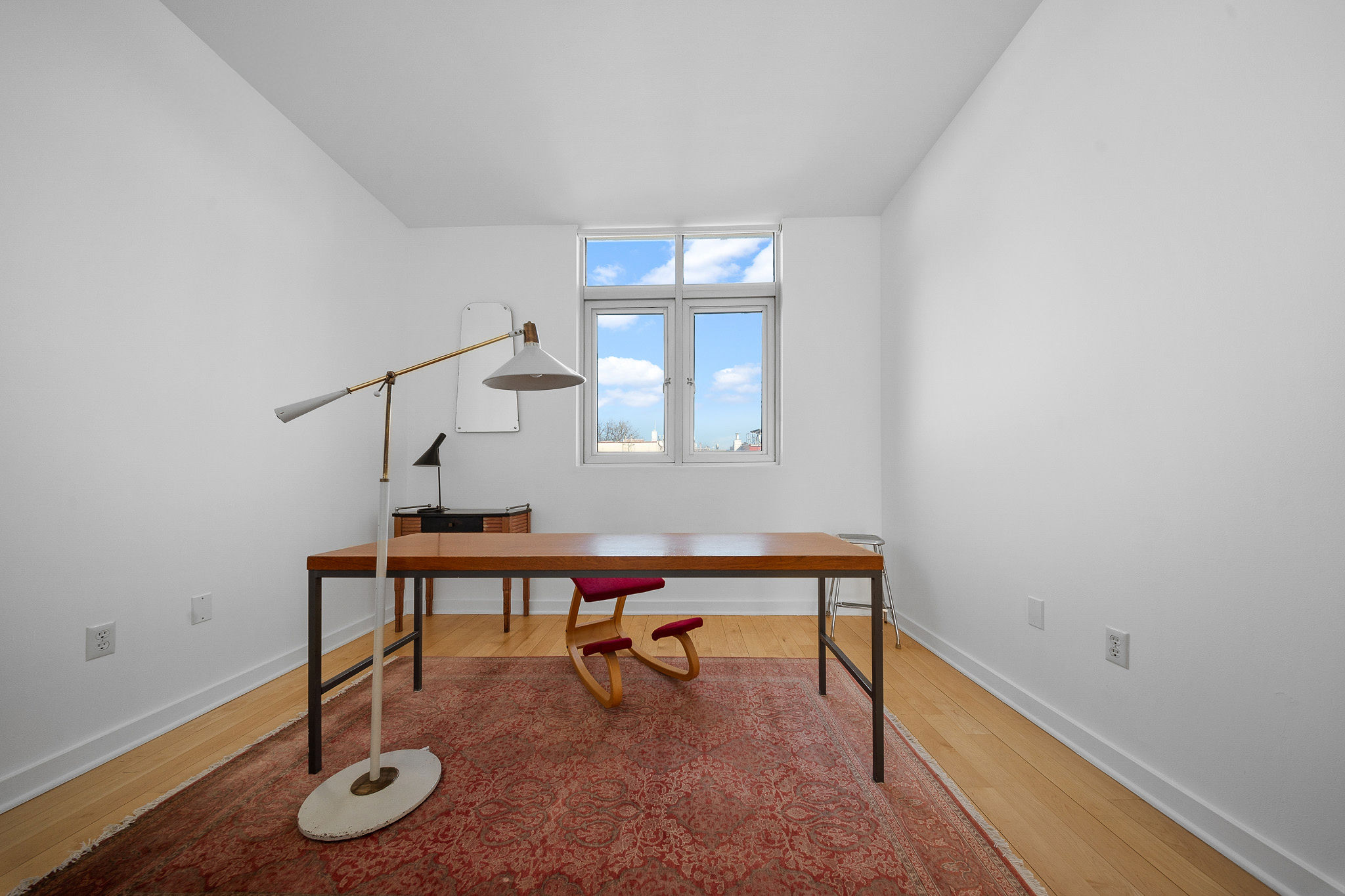 82 Guernsey Street, Unit 3B Brooklyn, NY 11222 - Photo 14 of 18 a room with furniture and window