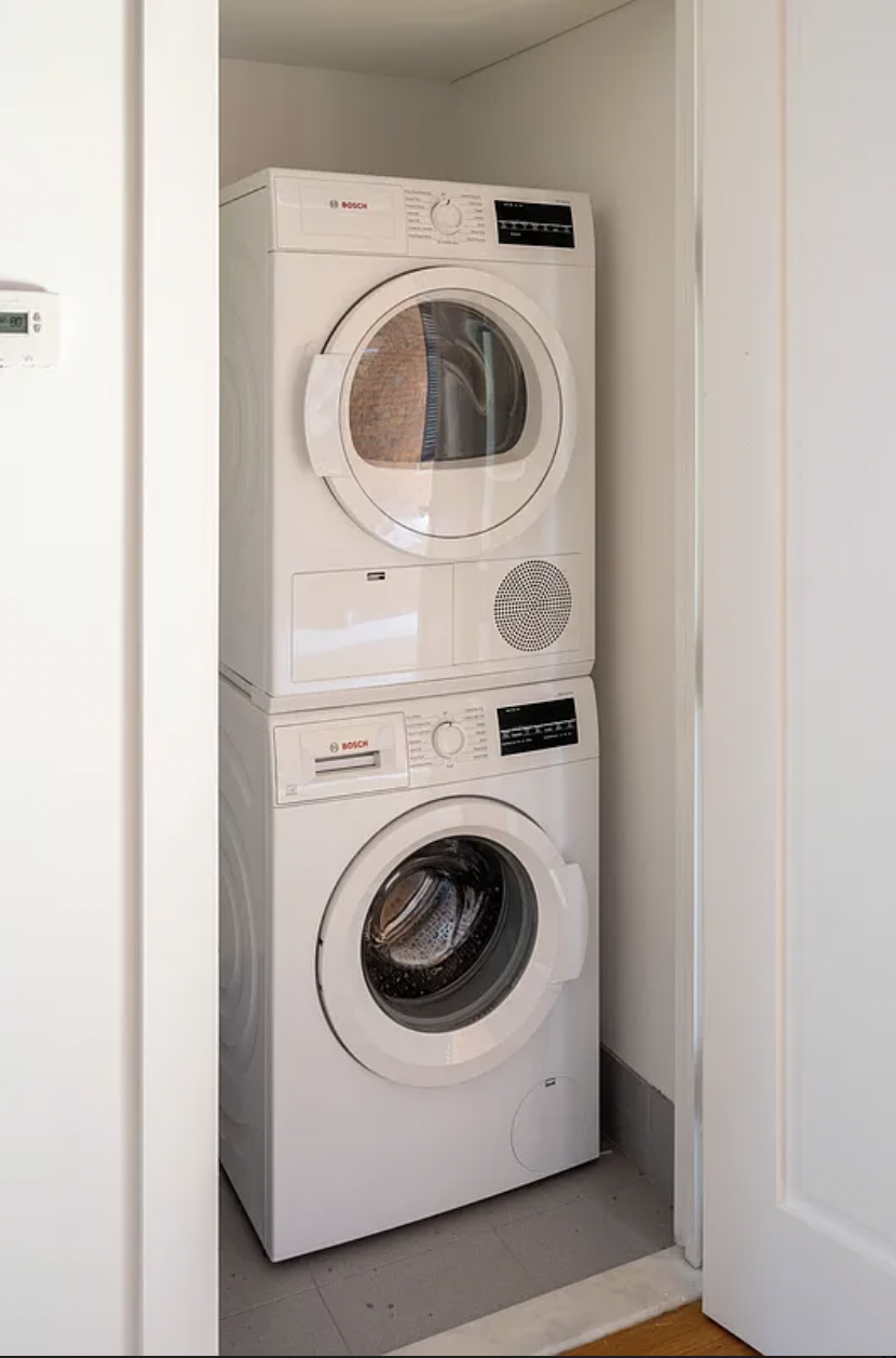 139 North 10th Street, Unit 4B Brooklyn, NY 11249 - Photo 7 of 10 a utility room with dryer and washer
