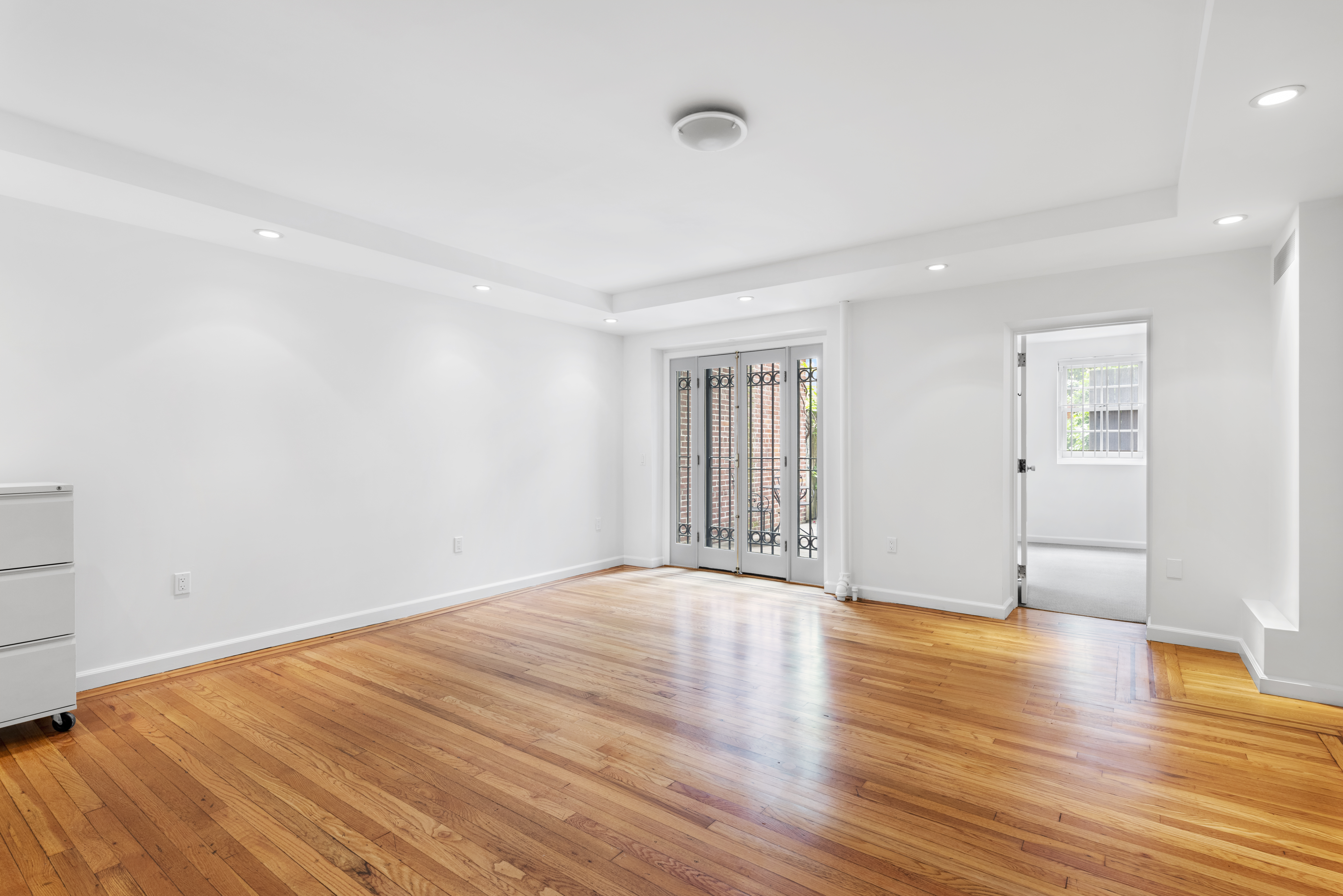 325 West 84th Street, Unit MAIS Manhattan, NY 10024 - Photo 7 of 9 a view of an empty room with wooden floor and a window
