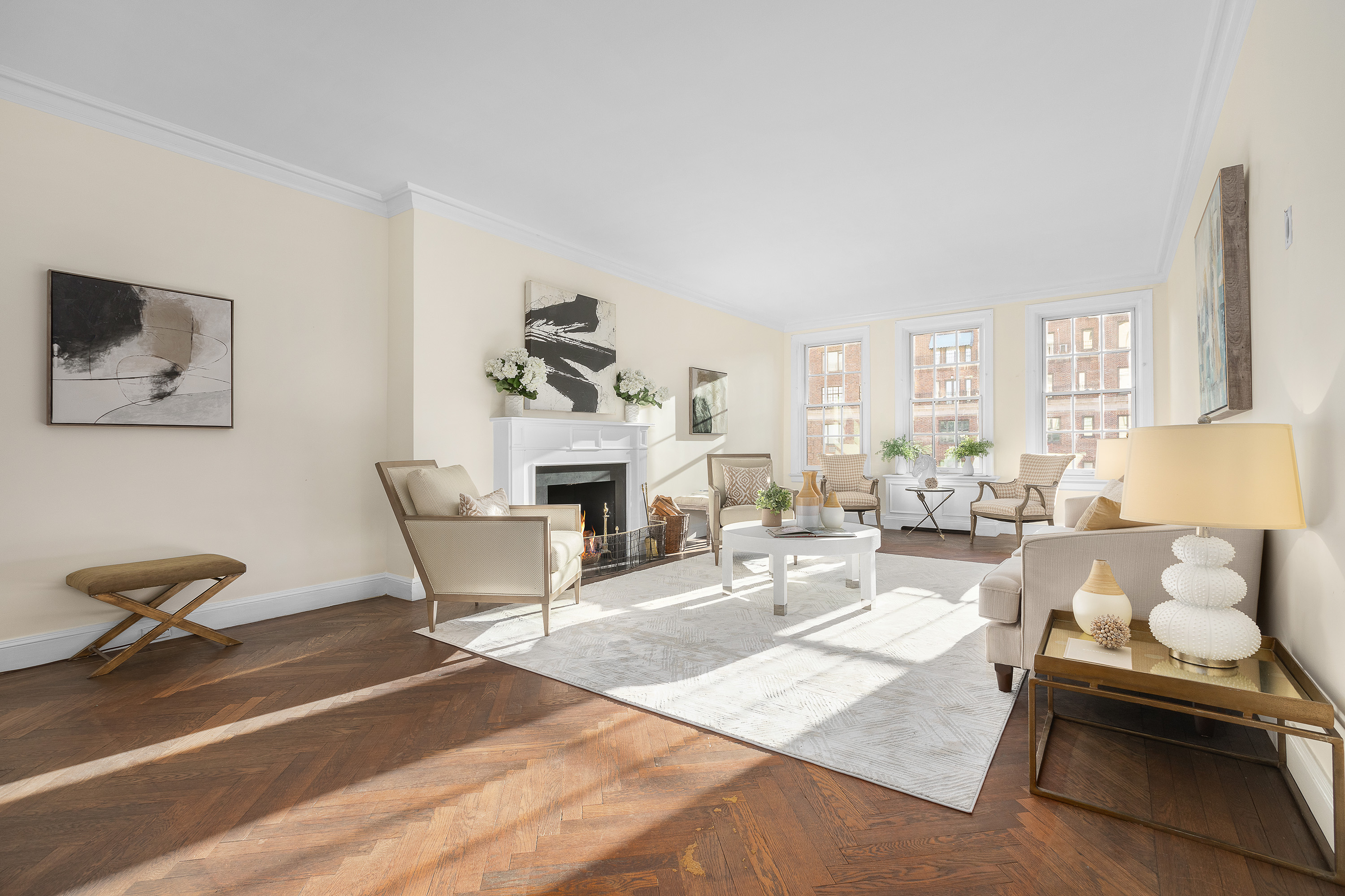 1088 Park Avenue, Unit 15C Manhattan, NY 10128 - Photo 2 of 26 a living room with furniture and a window
