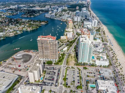 a picture of a bathroom with a white wall