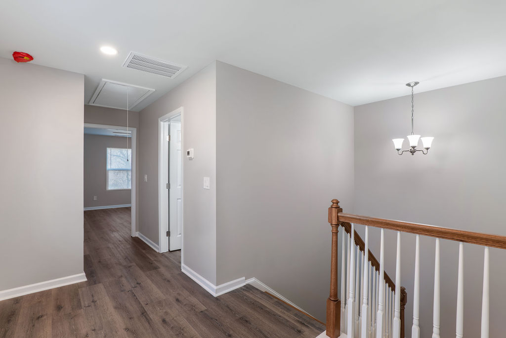 320 Adams Avenue Batesburg, SC 29006 - Photo 20 of 28 a view of a hallway with wooden floor
