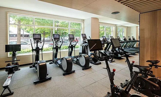 20 River Terrace, Unit 22A Manhattan, NY 10282 - Photo 24 of 27 a view of a room with gym equipment