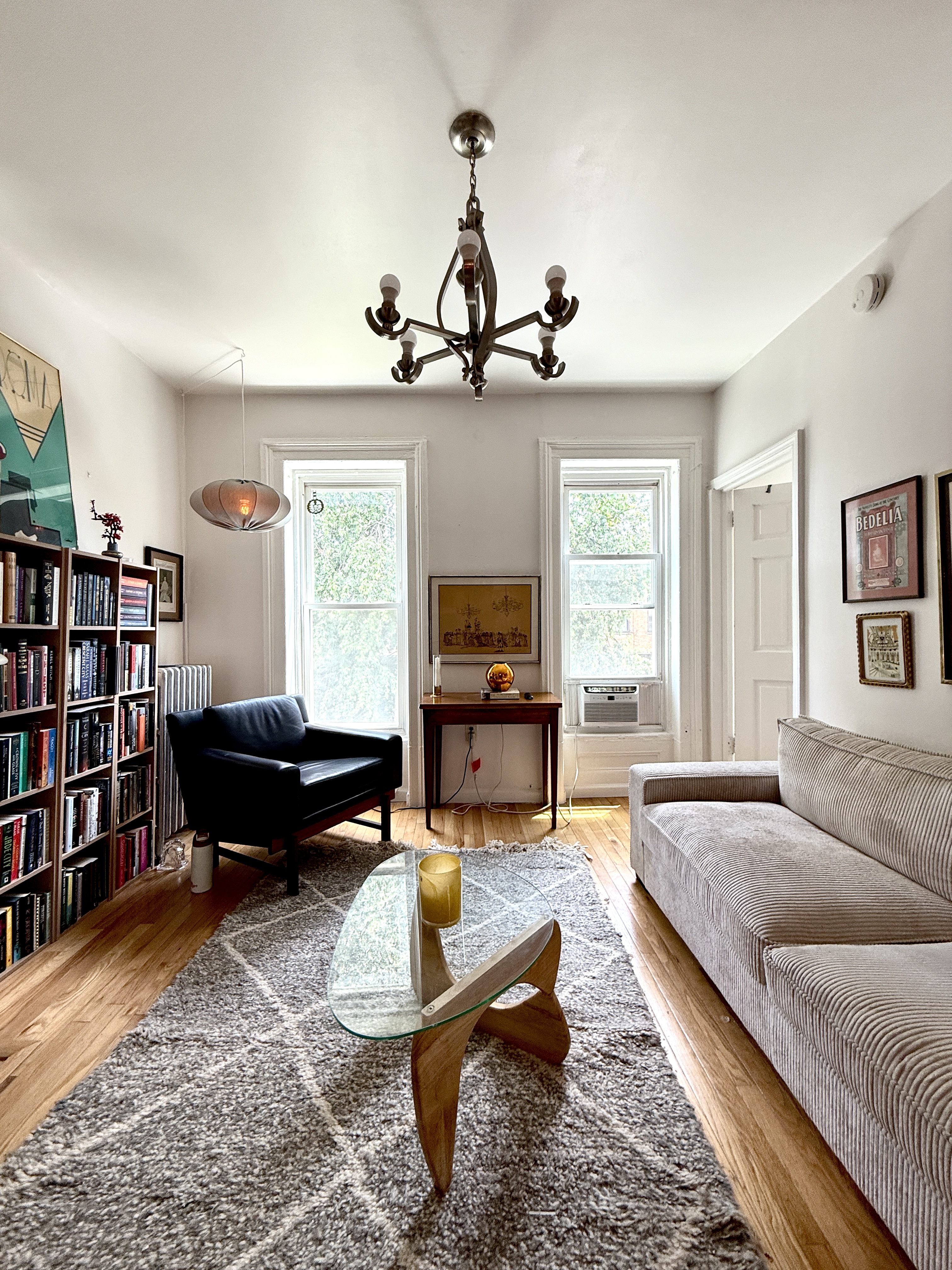 582 Monroe Street, Unit 2 Brooklyn, NY 11221 - Photo 3 of 18 a living room with furniture and a wooden floor