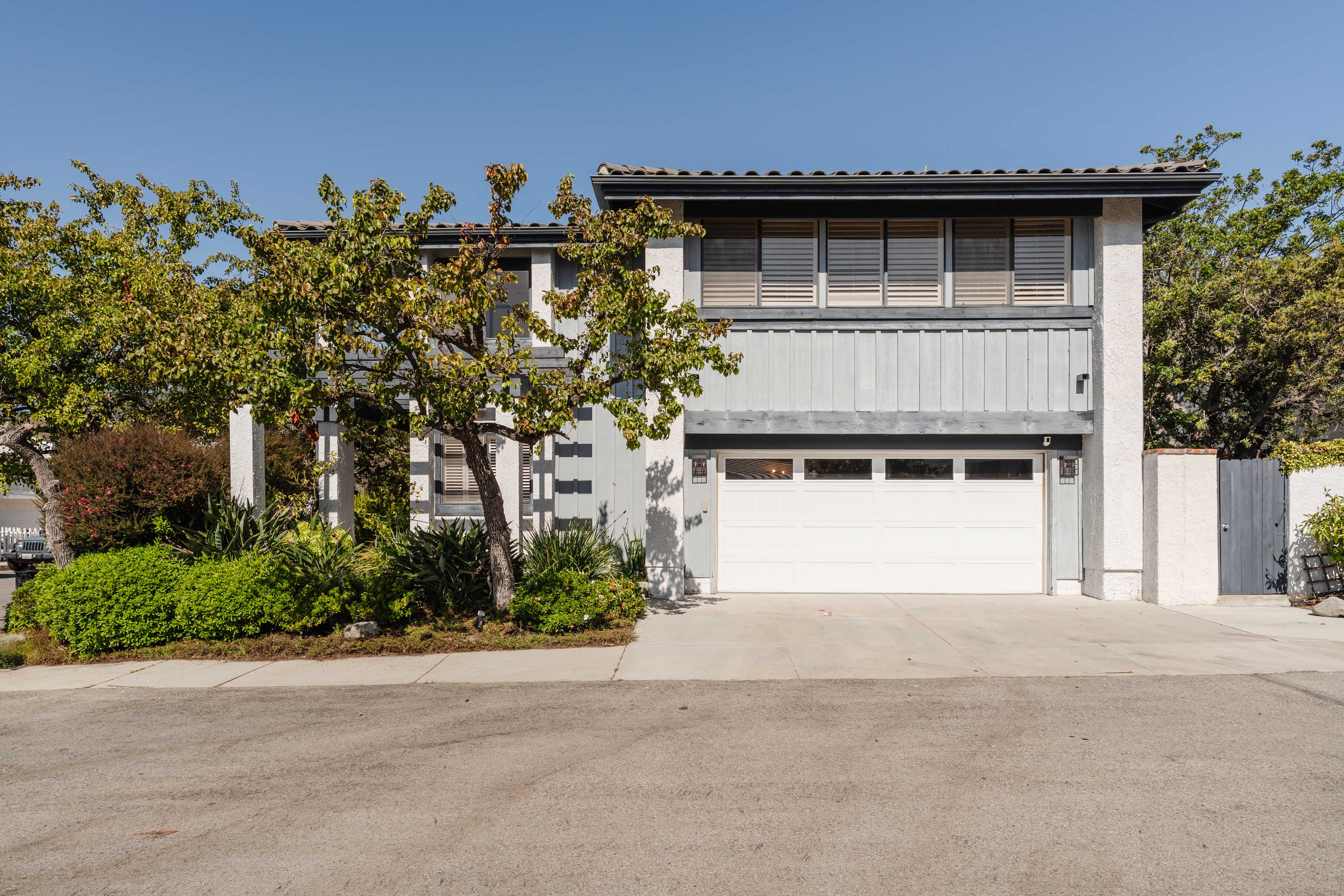 17273 Avenida De La Herradura Pacific Palisades, CA 90272 - Photo 22 of 23 front view of a house with a yard