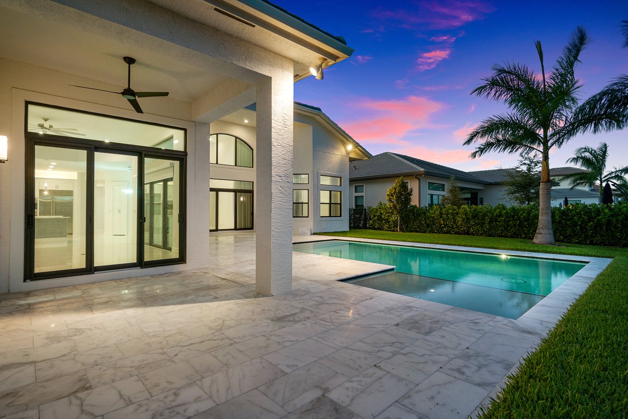 17352 Rosella Road Boca Raton, FL 33496 - Photo 28 of 41 a view of a house with a swimming pool and porch with furniture