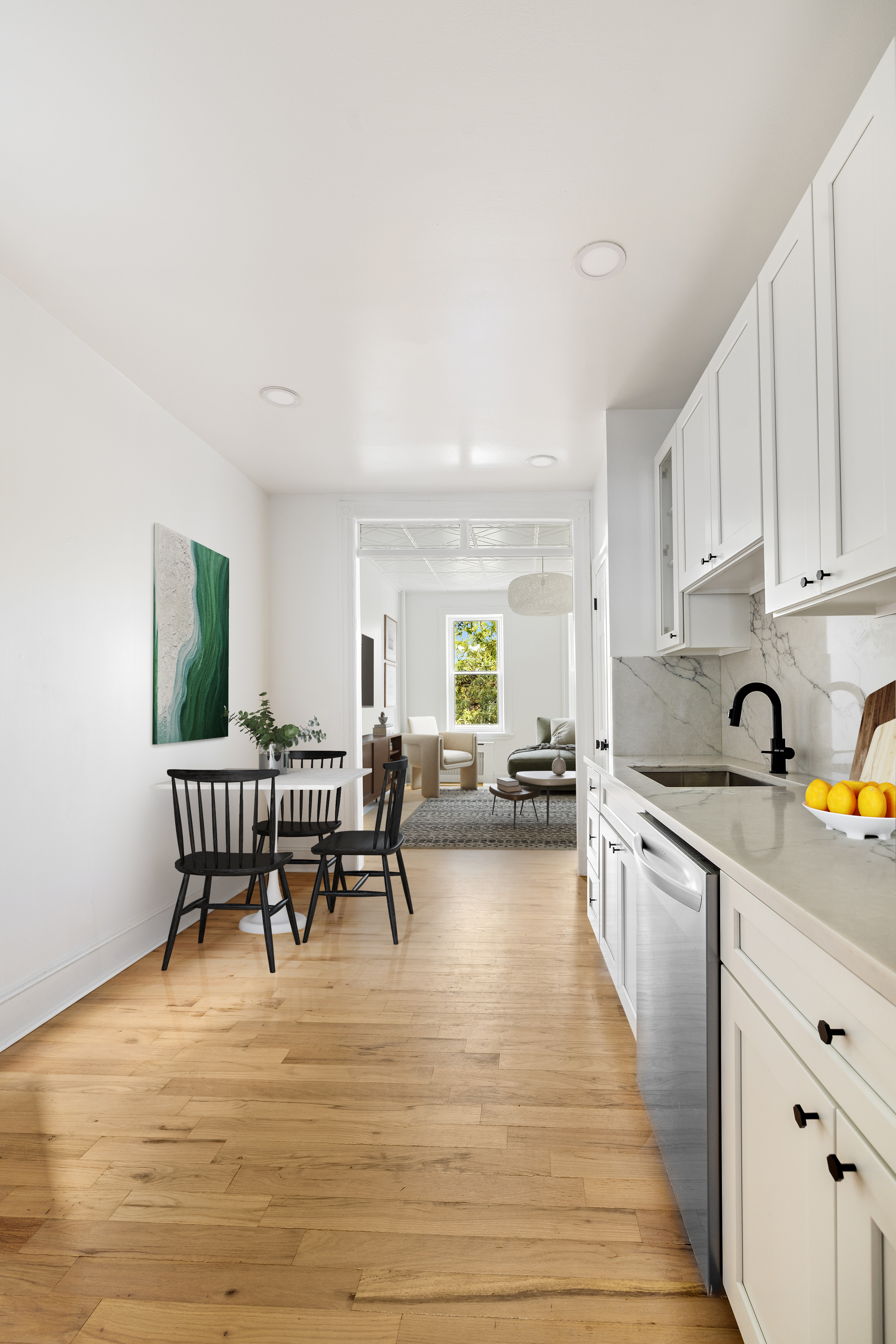 456 Prospect Avenue, Unit 3R Brooklyn, NY 11215 - Photo 5 of 16 a kitchen with a wooden table and chairs