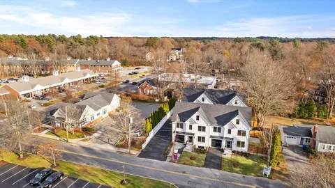 a view of a large building with a mountain in the background