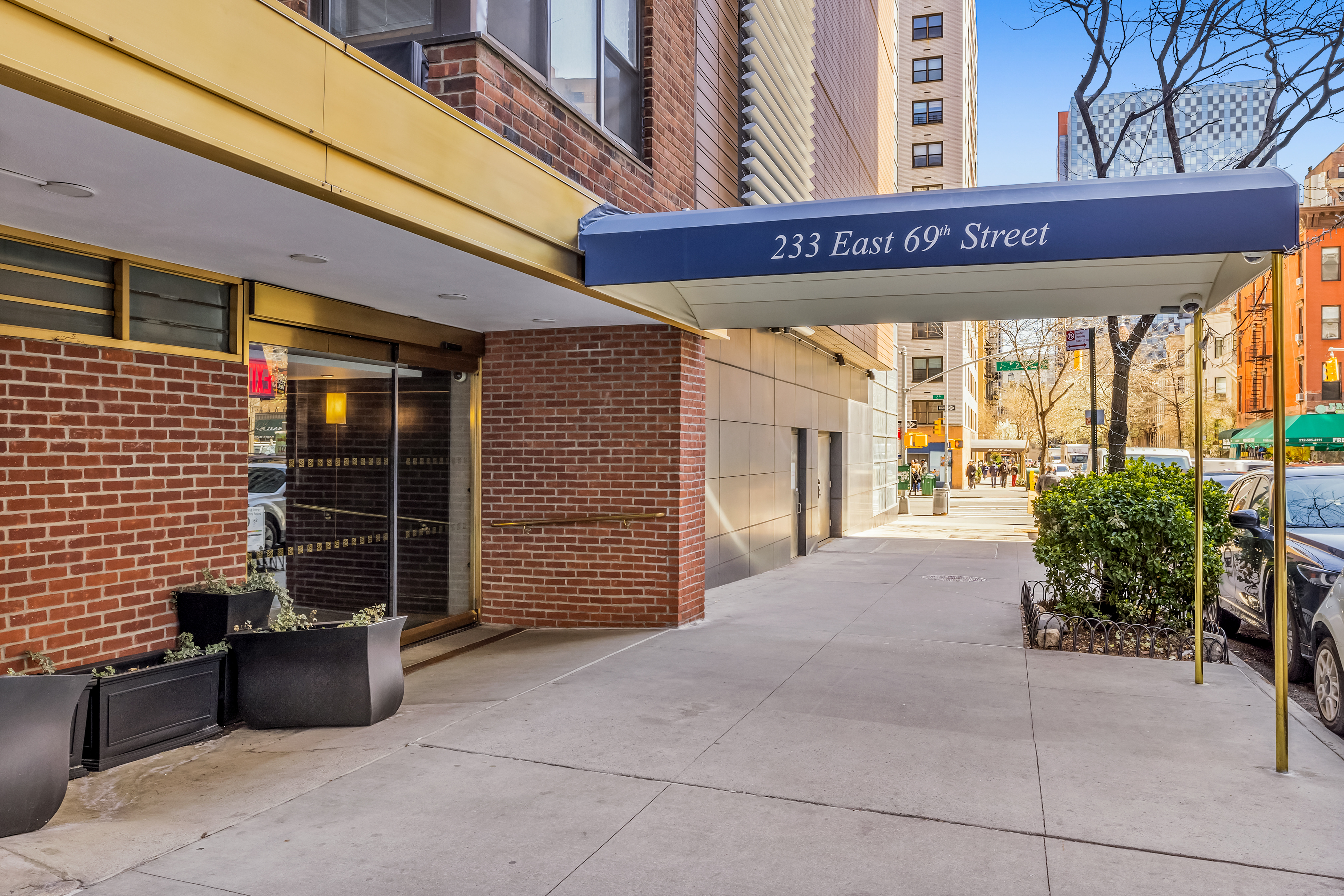 233 East 69th Street, Unit 2C Manhattan, NY 10021 - Photo 9 of 10 a view of a building with furniture