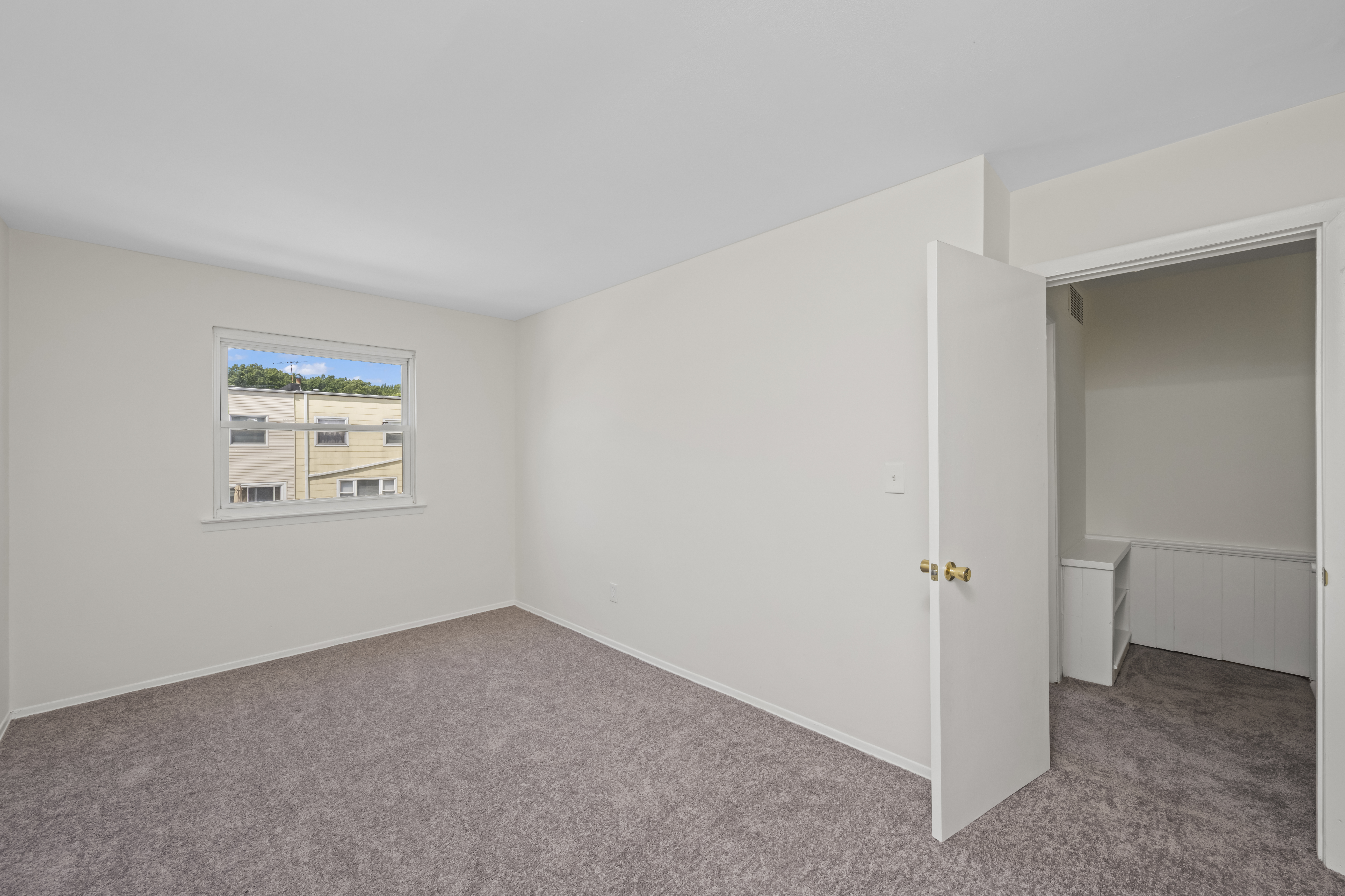 12 Yucca Drive Staten Island, NY 10312 - Photo 13 of 21 a view of an empty room with closet area