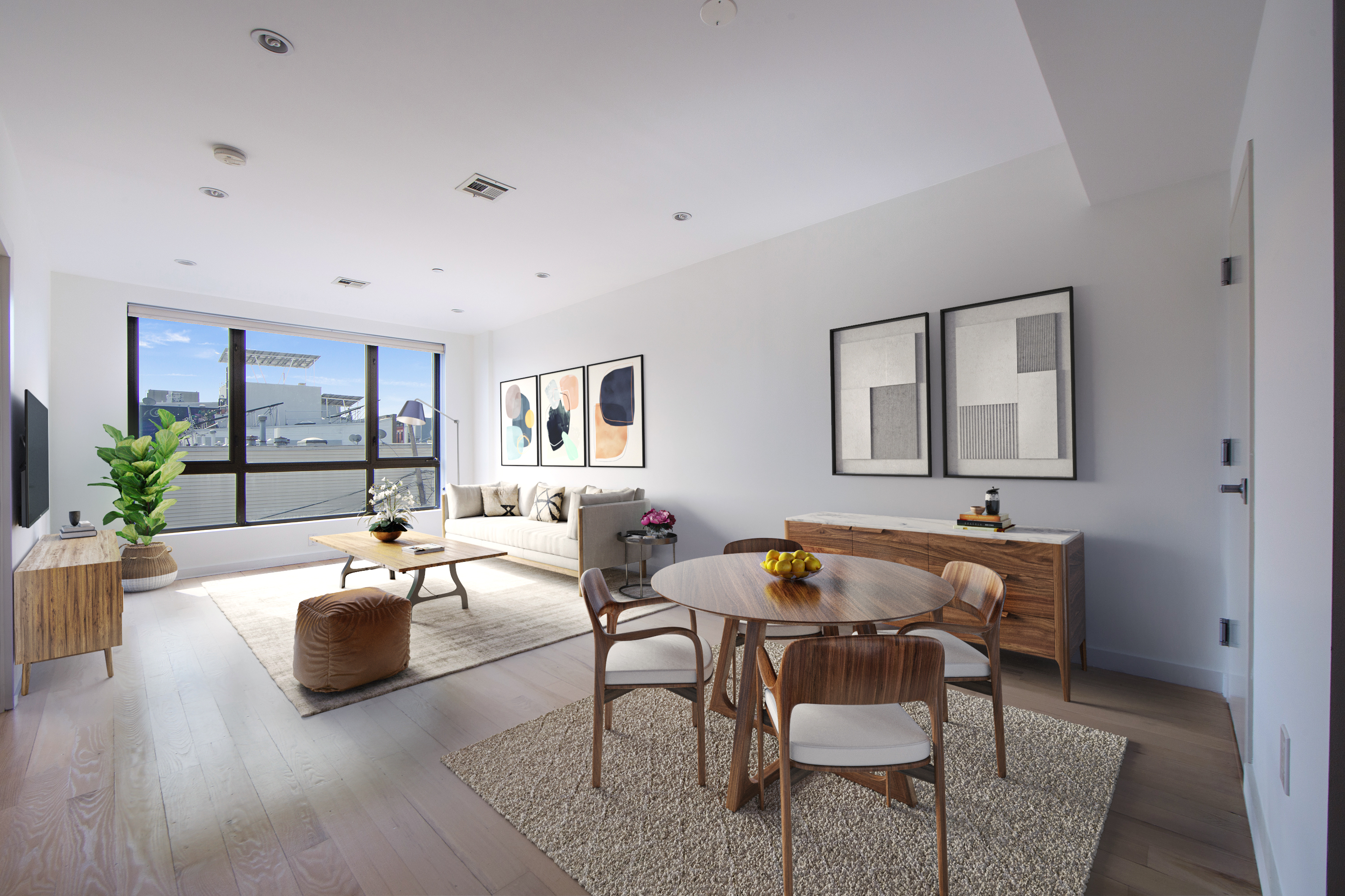 328 Central Avenue, Unit 3B Brooklyn, NY 11221 - Photo 2 of 11 a living room with furniture and wooden floor