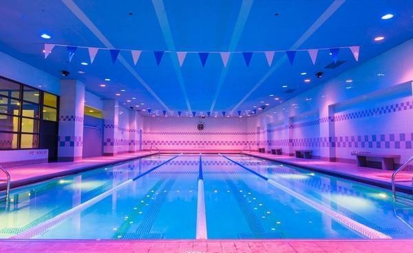 350 West 50th Street, Unit 3LL Manhattan, NY 10019 - Photo 10 of 15 a room with lots of gym equipment