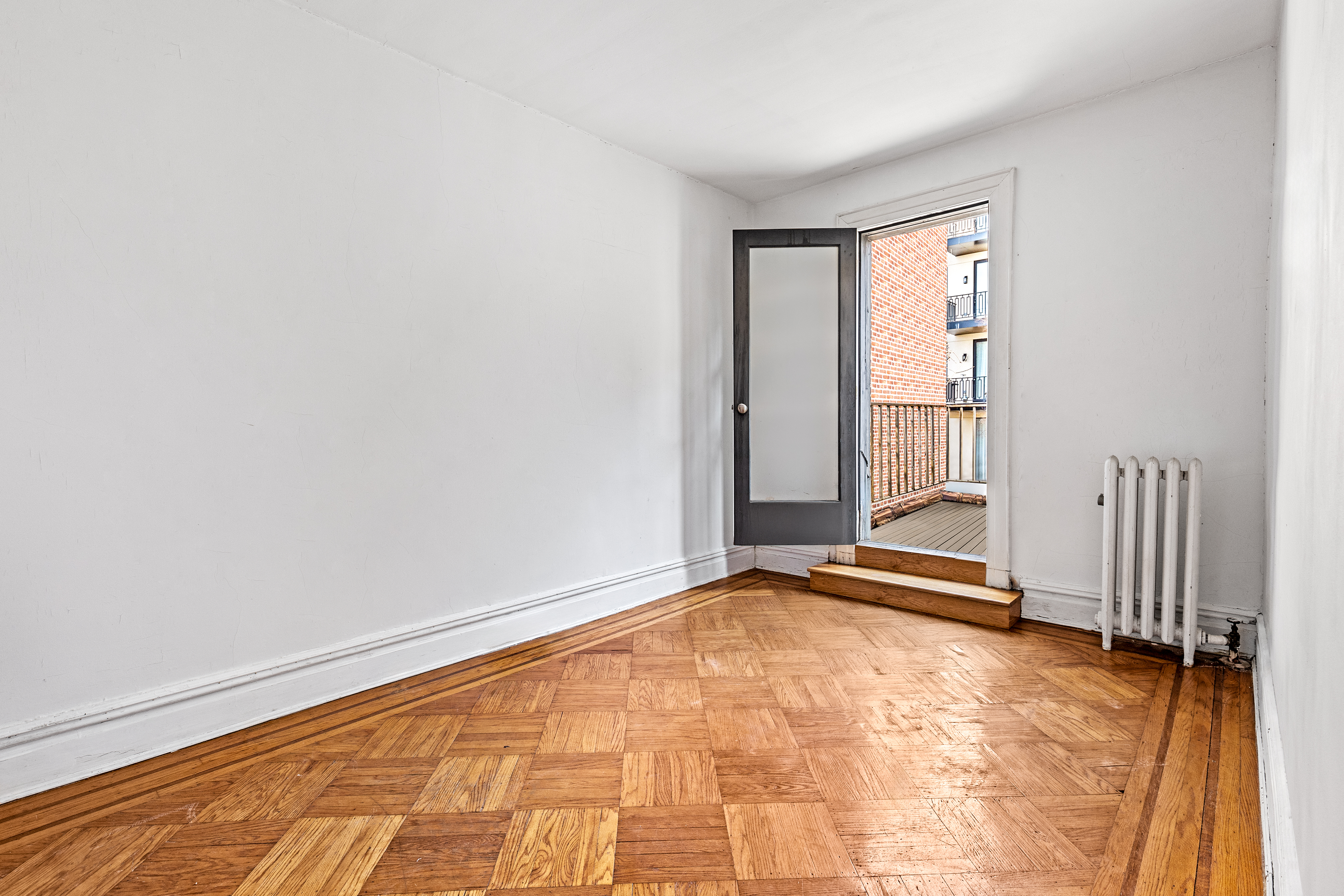 555 16th Street Brooklyn, NY 11215 - Photo 12 of 19 an empty room with windows