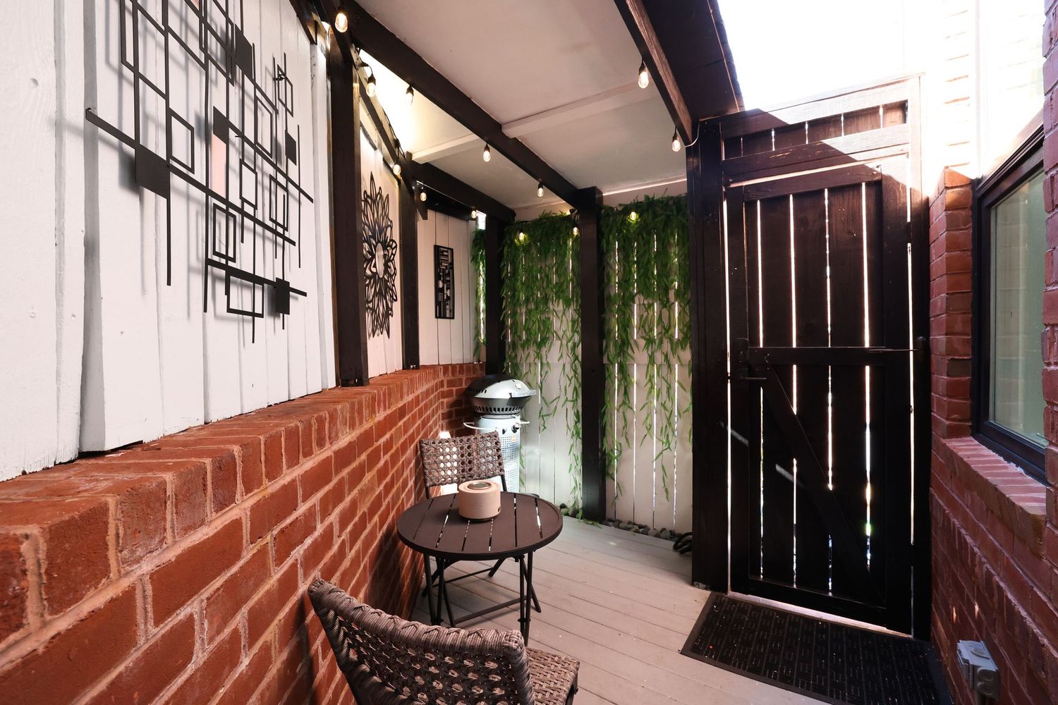 1630 19th Street Northwest, Unit C Washington, DC 20009 - Photo 38 of 45 a view of balcony with furniture and wooden floor
