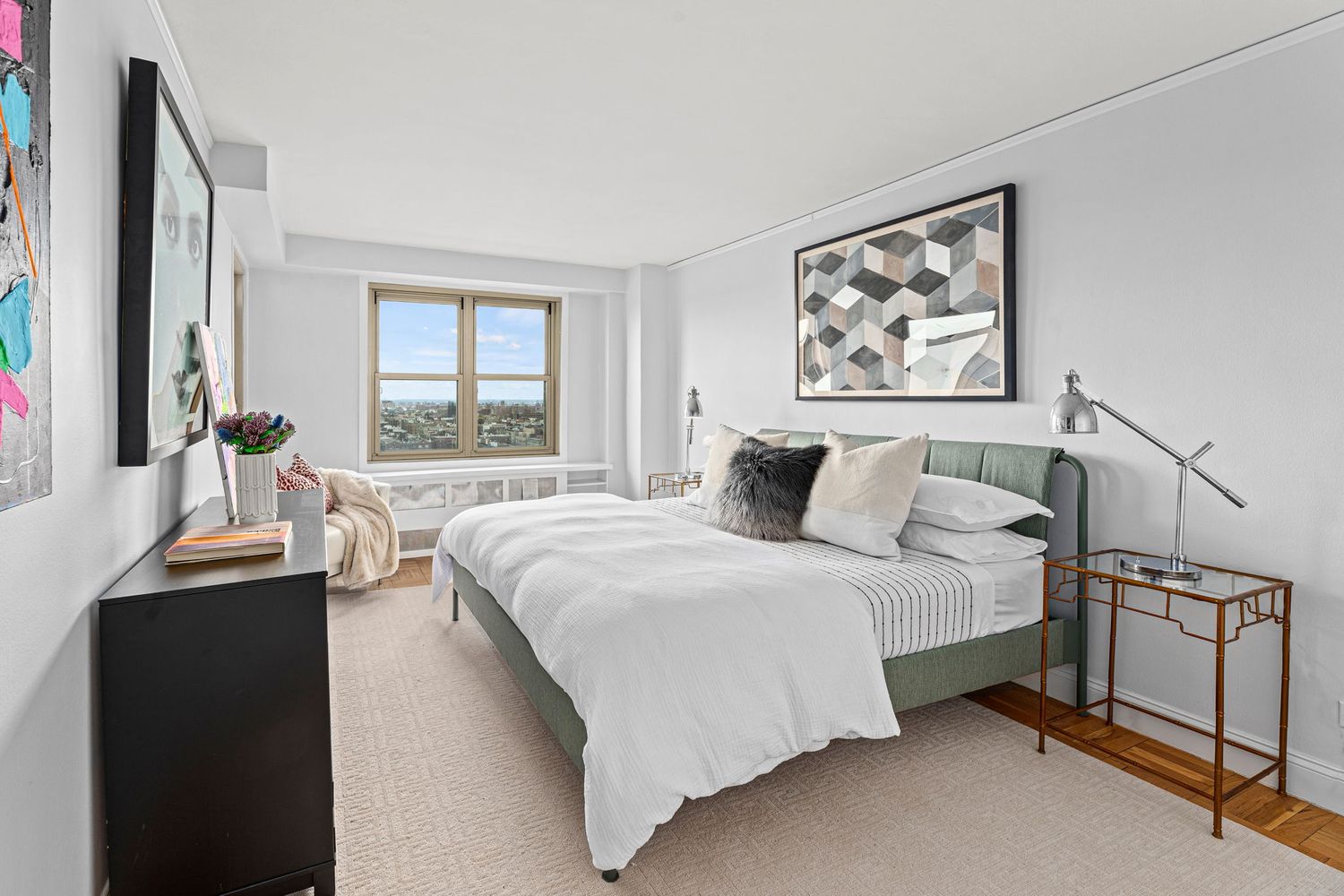 900 West 190th Street, Unit 14E Manhattan, NY 10040 - Photo 7 of 9 a bedroom with a bed and a window