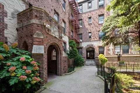 a view of building with outdoor seating