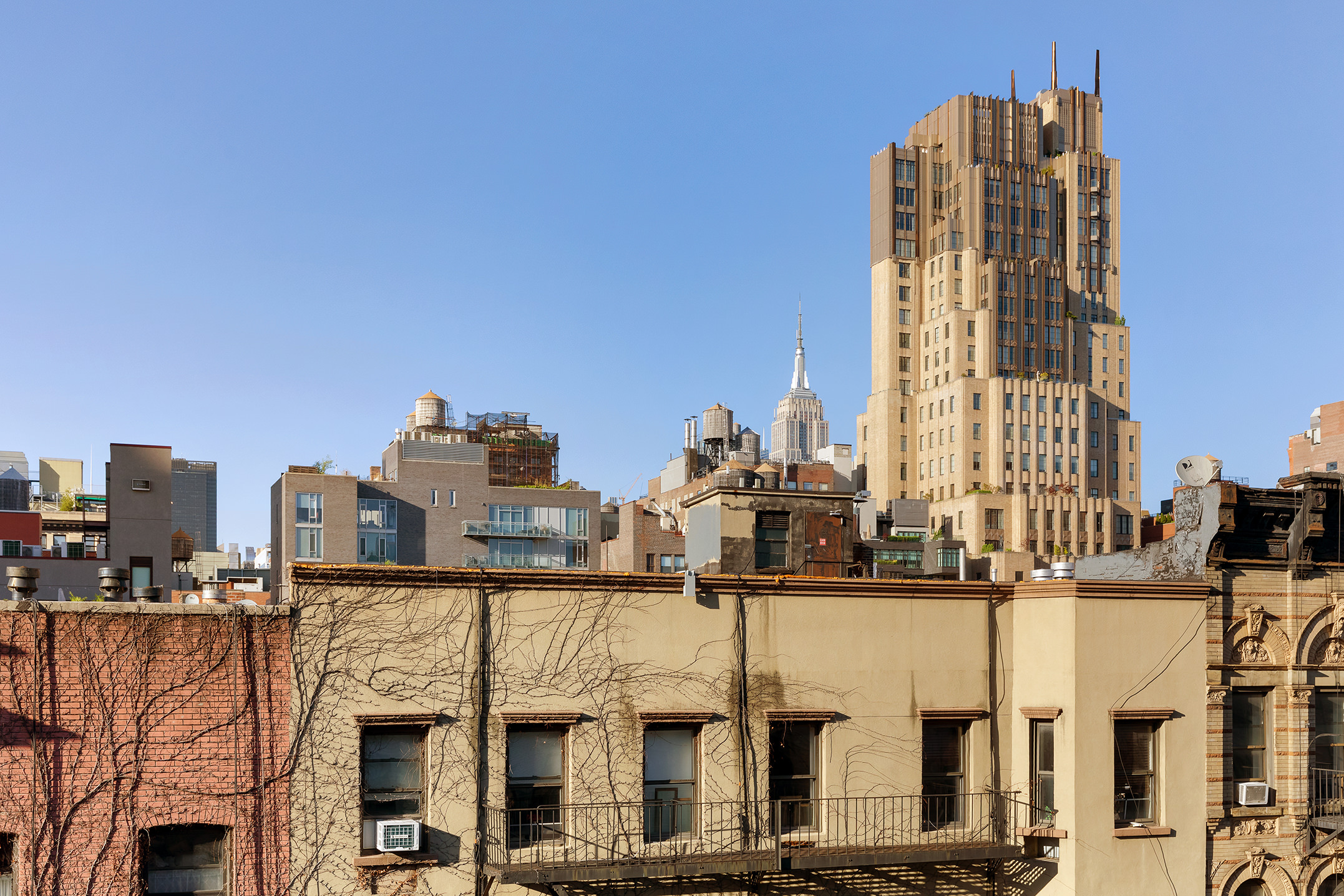 250 West 15th Street, Unit PH6E Manhattan, NY 10011 - Photo 2 of 9 a front view of a building with glass windows