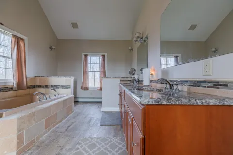 a view of a swimming pool with a yard