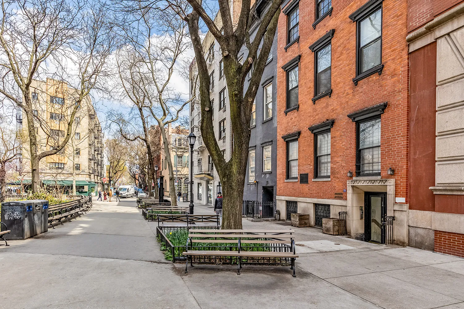 a view of park with large trees